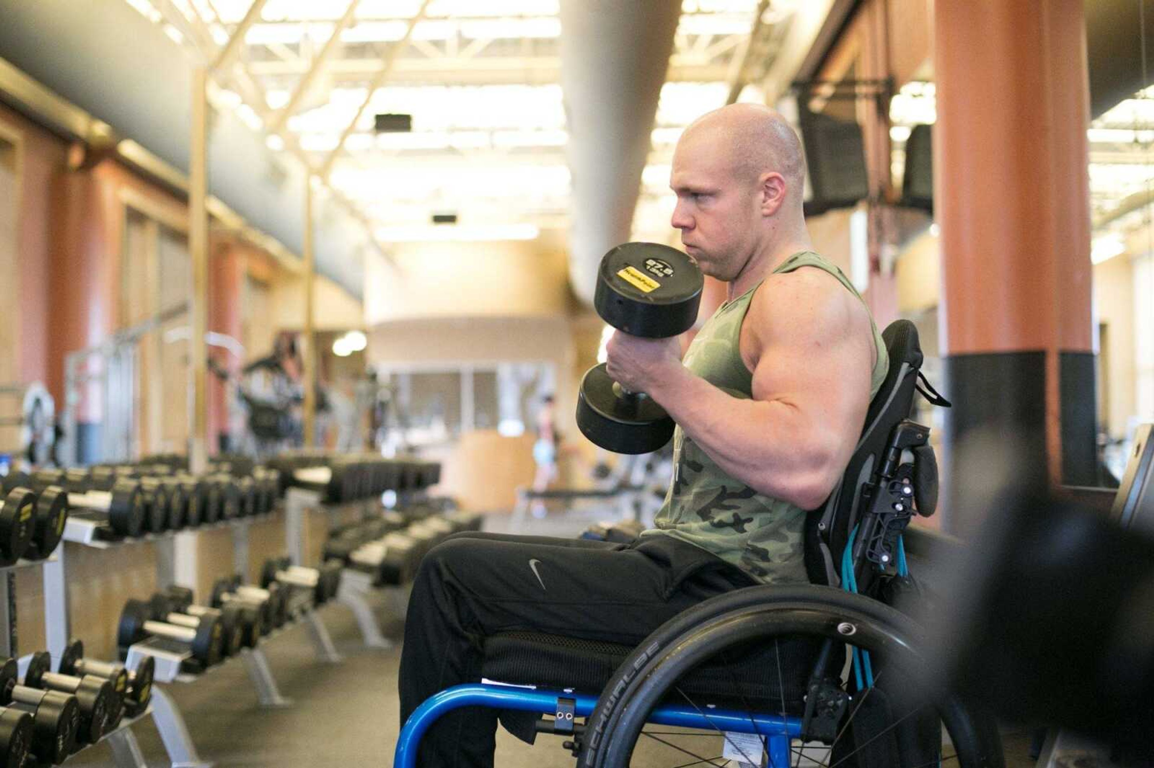 Brandon Strop moves through his workout routine at HealthPoint Fitness Tuesday, Sept. 29, 2015 in Cape Girardeau. (Glenn Landberg)