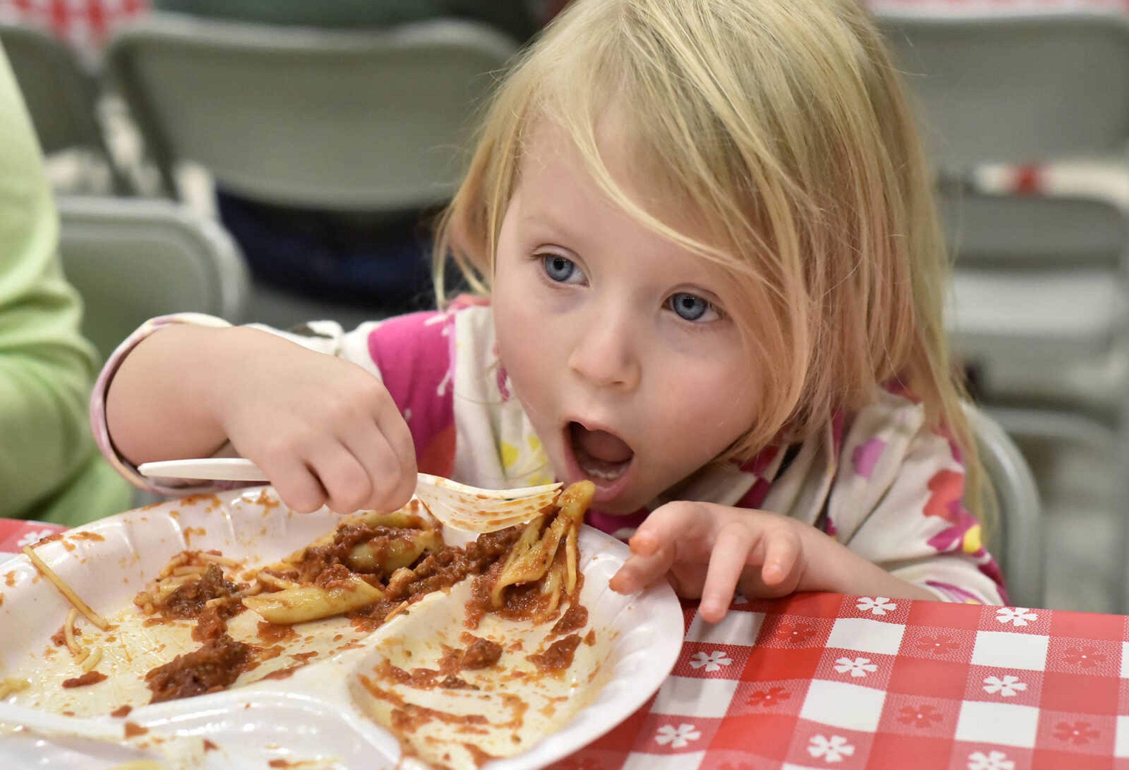 LAURA SIMON ~ lsimon@semissourian.com

Vivienne Tilghman eats mostaccioli during the annual spaghetti day fundraiser for the Cape Girardeau Parks and Recreation Foundation on Thursday, Nov. 10, 2016, at the A.C. Brase Arena Building.