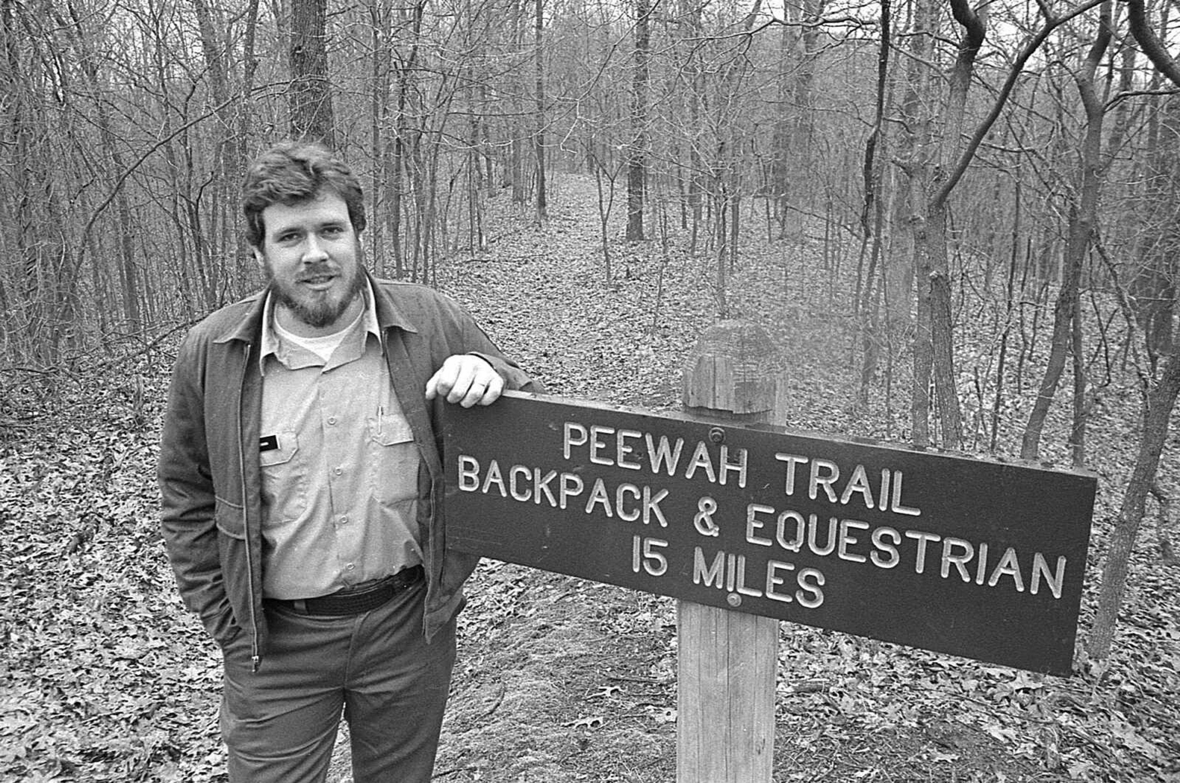 Published Feb. 27, 1987.
It was the job of Trail of Tears State Park naturalist Greg Henson to make a visit to the park a more meaningful and enjoyable experience for young and old. One of Henson's projects was the renovation of the Peewah Trail which permitted better access to the winding trail. (David Hente ~ Southeast Missourian archive)