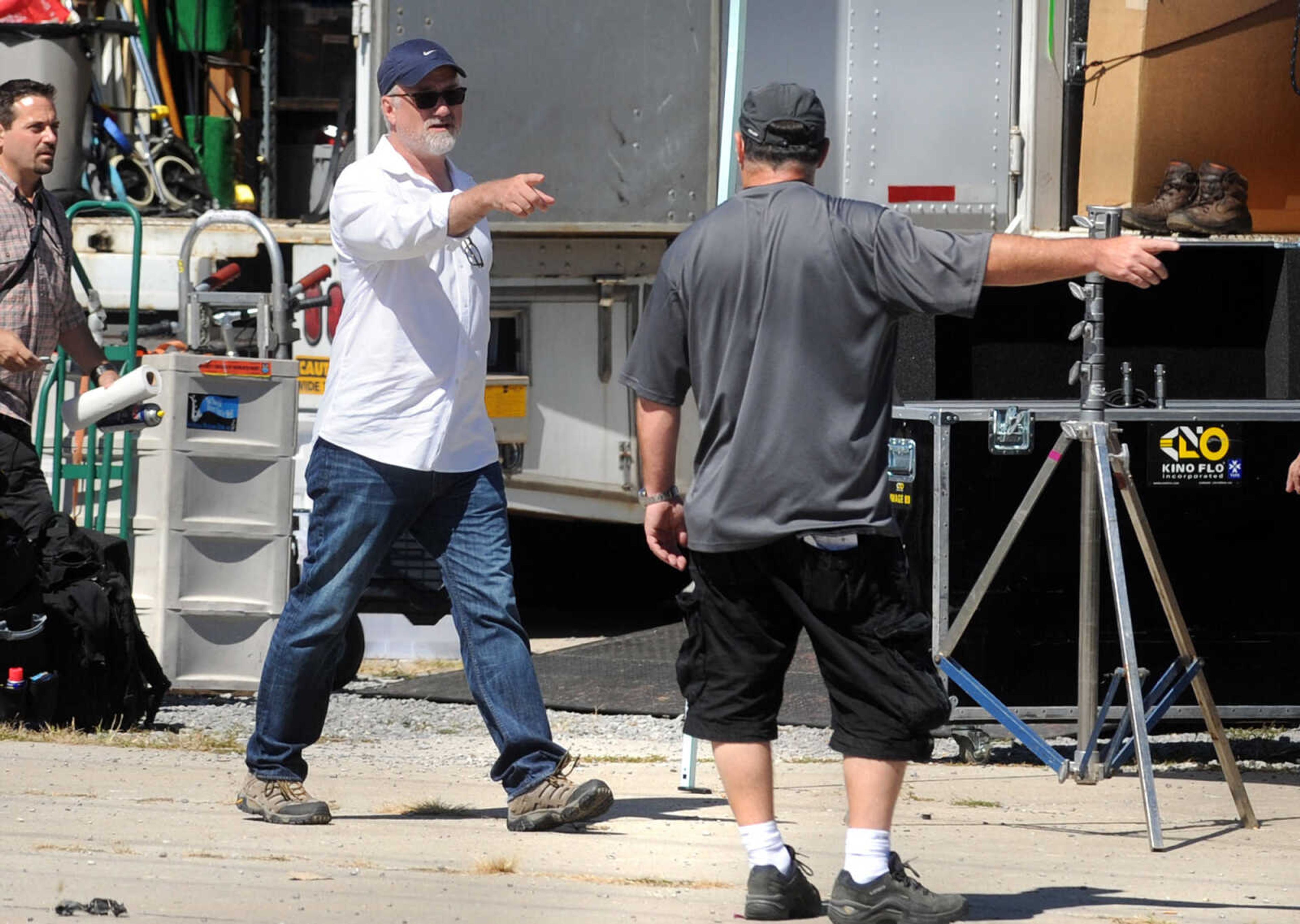 LAURA SIMON ~ lsimon@semissourian.com

A man believed to be director David Fincher, prepares for a scene for 20th Century Fox's feature film "Gone Girl", near the Bill Emerson Memorial Bridge, Monday, Sept. 23, 2013, in Cape Girardeau.