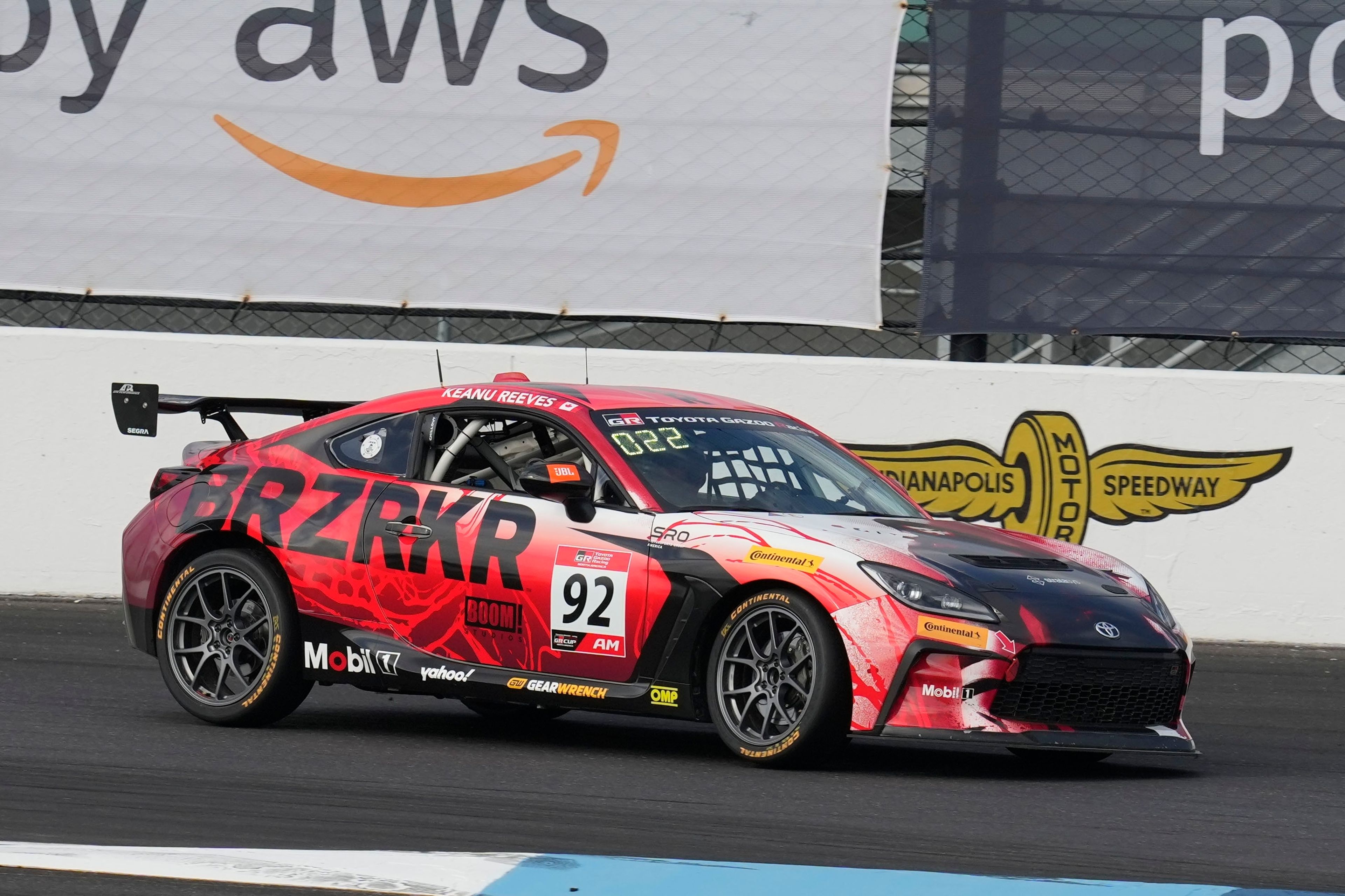 Keanu Reeves drives during the GR Cup Series auto race at Indianapolis Motor Speedway, Saturday, Oct. 5, 2024, in Indianapolis. (AP Photo/Darron Cummings)