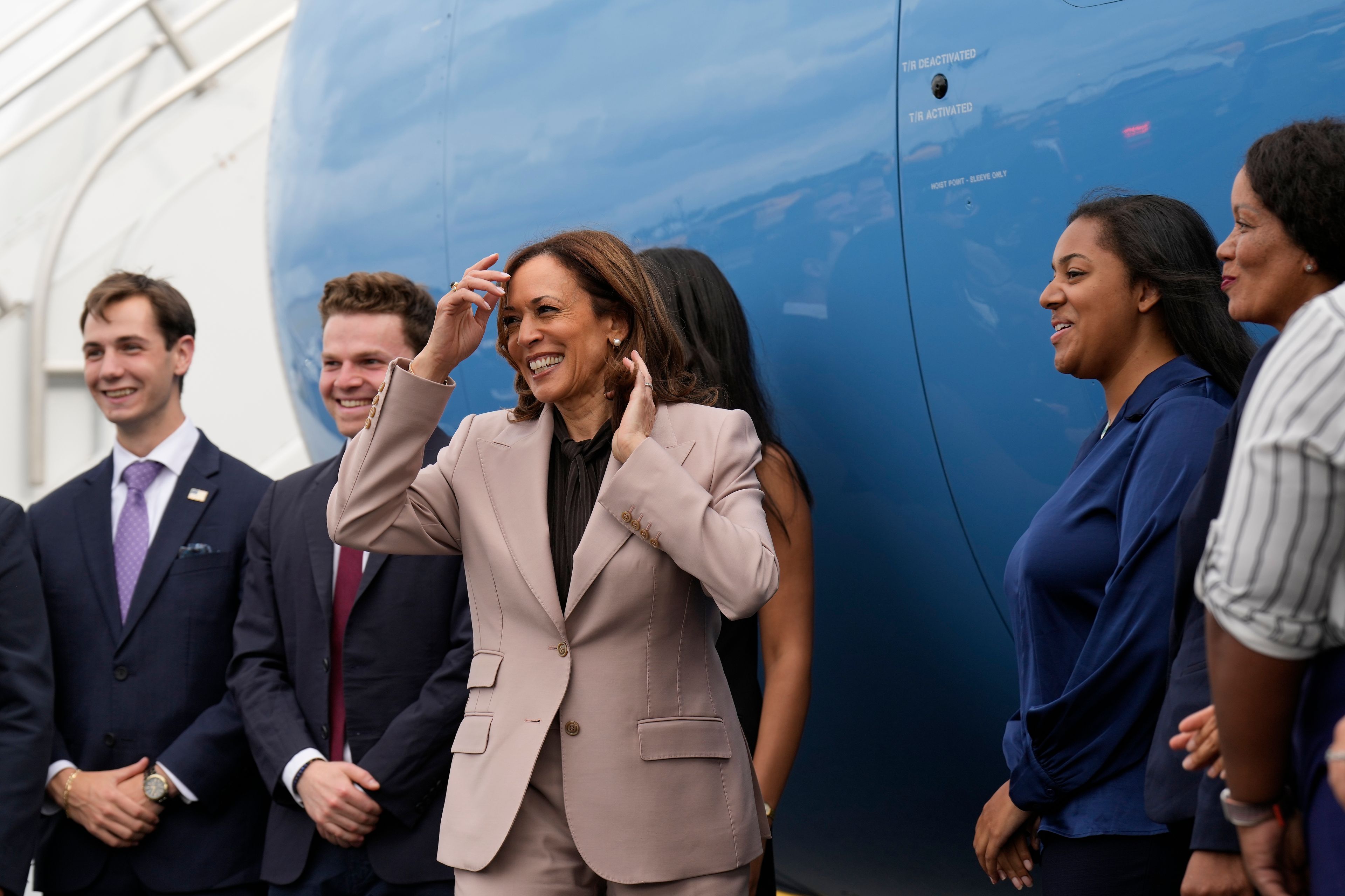 Democratic presidential nominee Vice President Kamala Harris meets with staff on the tarmac before boarding Air Force Two, Monday, Sept. 9, 2024, near Philadelphia International Airport, in Philadelphia, Tuesday, Sept. 17, 2024. (AP Photo/Jacquelyn Martin)