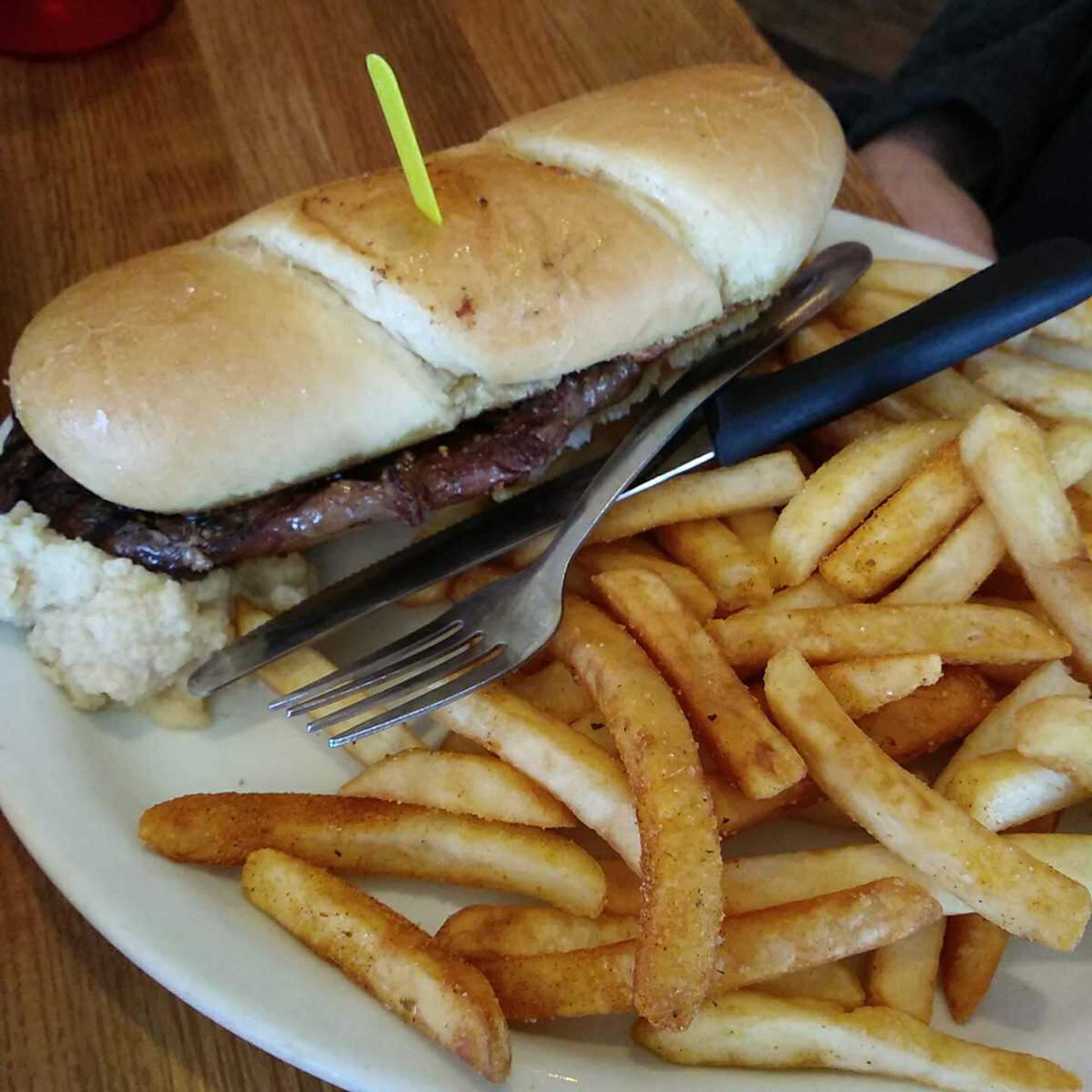 A Ribeye Sandwich from the Pilot House, a steak on a bun served with horseradish, simple but so satisfying.