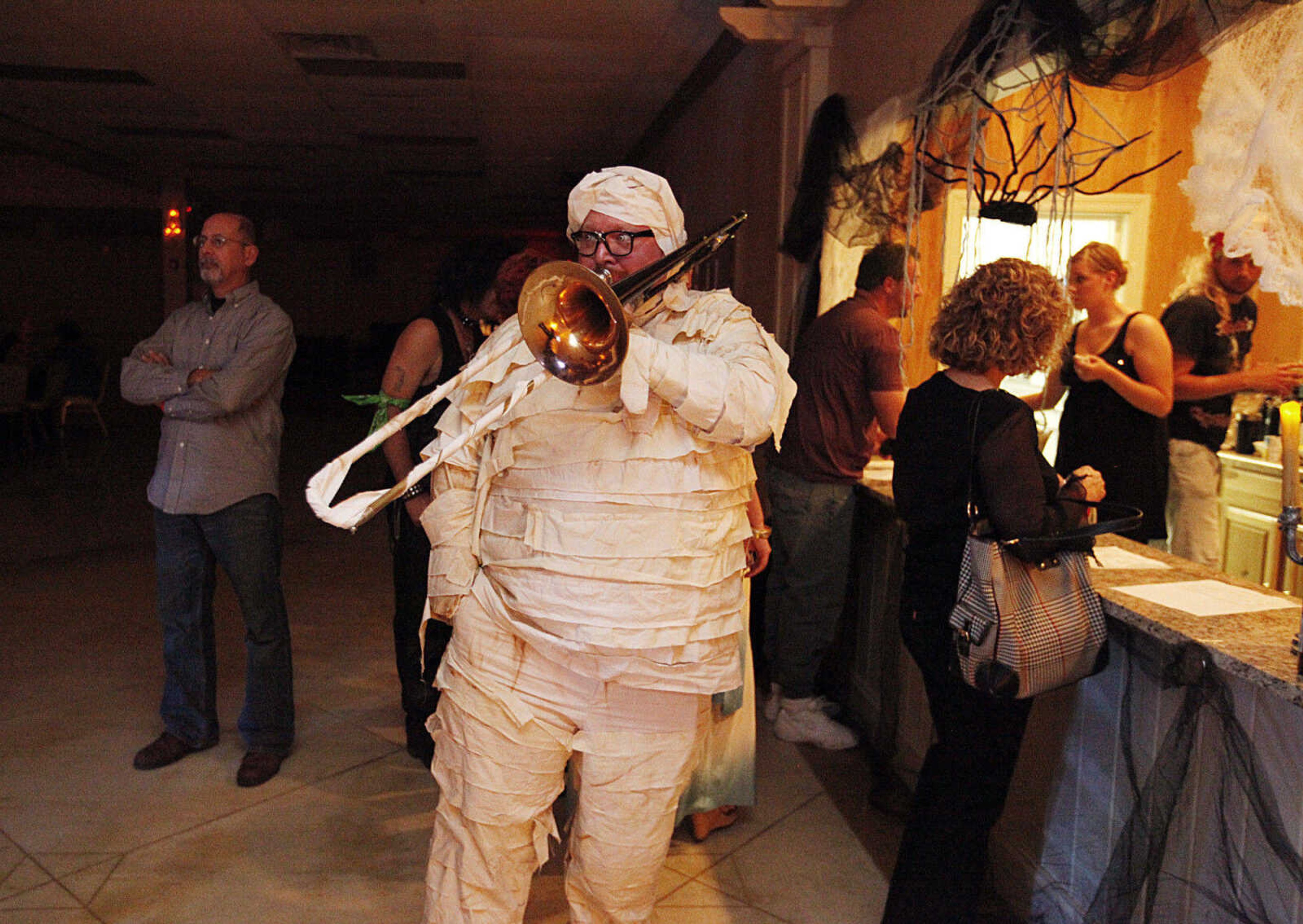 CHRIS MACKLER ~ photos@semissourian.com

Darren Burgfeld, of the band Mid-Life Crisis, dressed as a mummy at The Venue's Mega Halloween Bash in Cape Girardeau on Saturday, Oct. 30, 2010. According to The Venue owner and operator Mike Jessup, 300 pre-sale tickets were sold for the bash, which was set up as an 80's theme party.