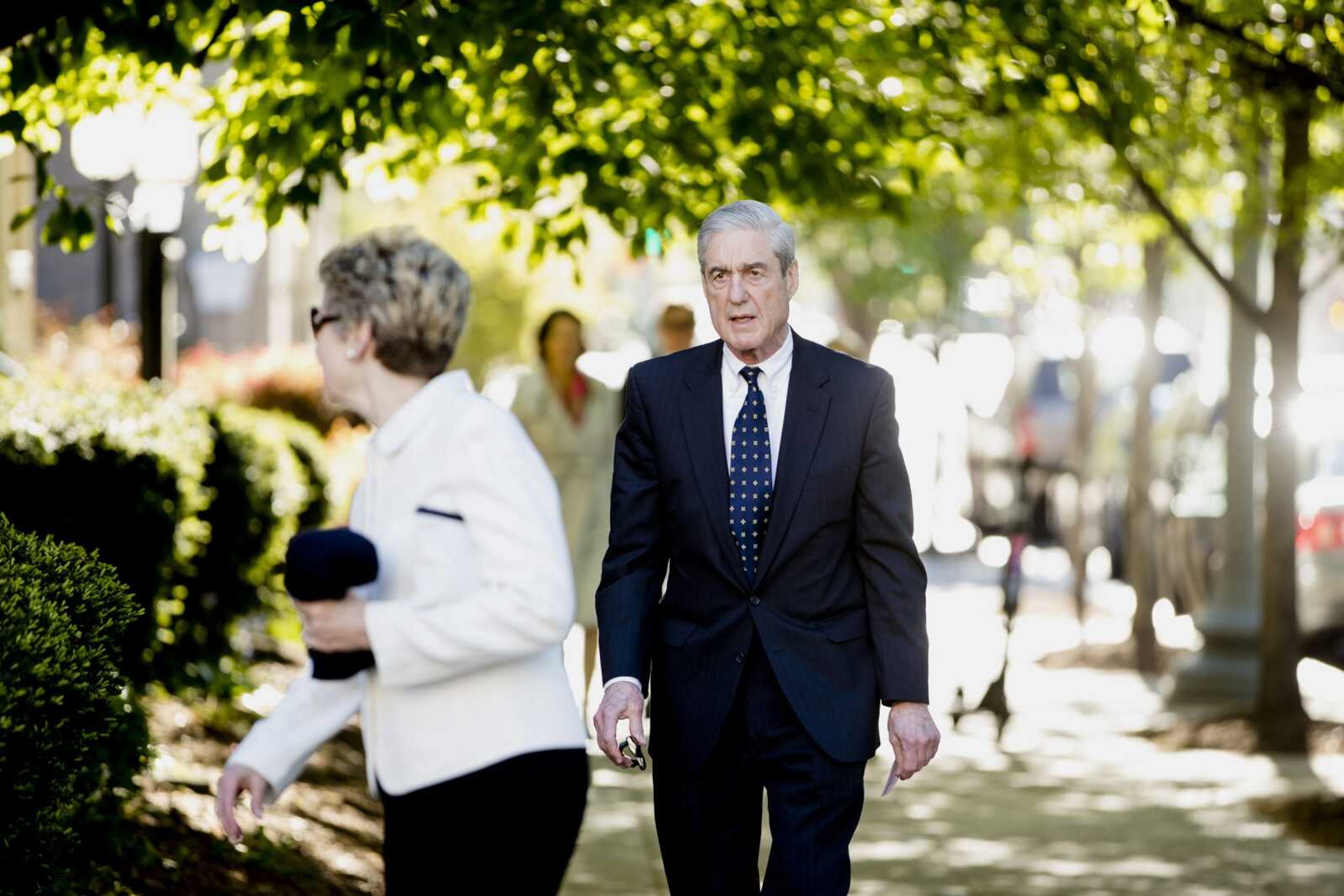 Special Counsel Robert Mueller and his wife, Ann Cabell Standish, arrive for Easter services Sunday at St. John's Episcopal Church in Washington.