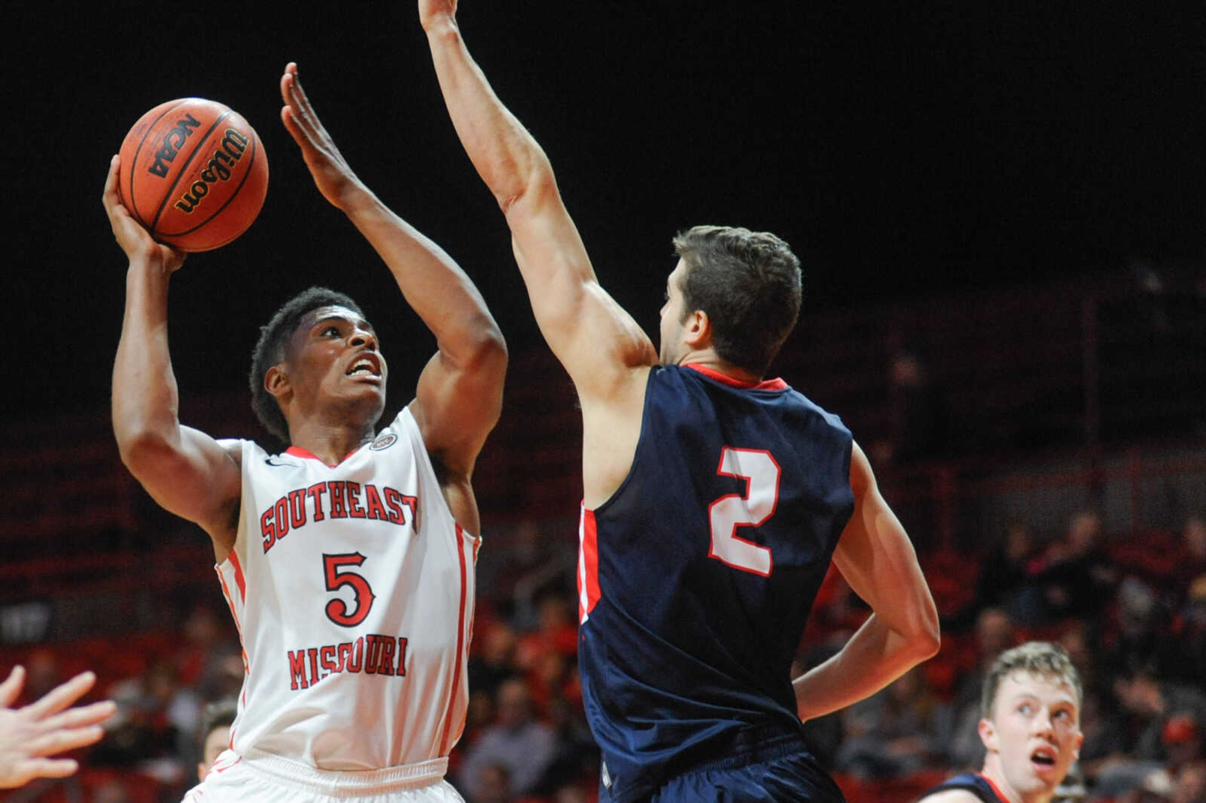 Southeast Missouri State's Joel Angus shoots around Belmont's Nick Smith the second half Thursday, Dec. 31, 2015 at the Show Me Center. (Glenn Landberg)