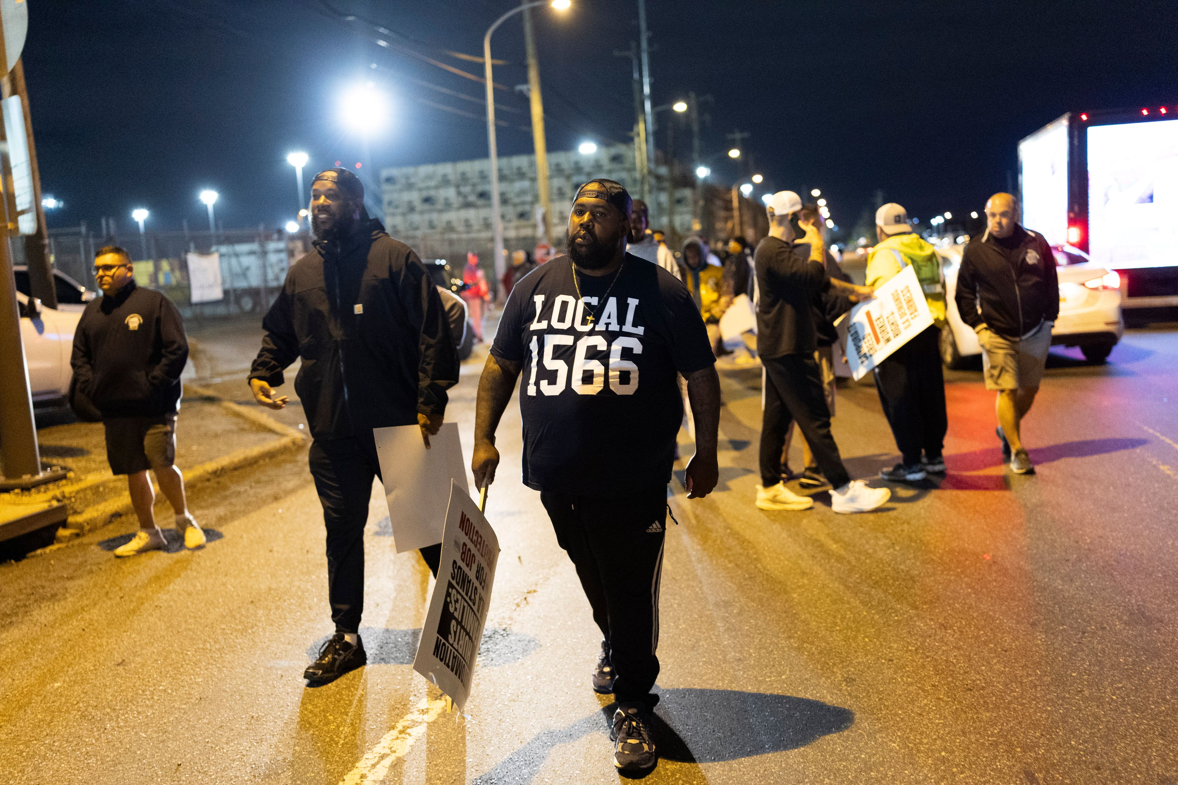 Philadelphia longshoremen assembled outside the Packer Avenue Marine Terminal Port begin to strike as their contract runs out at midnight, Tuesday, Oct. 1, 2024. (AP Photo/Ryan Collerd)