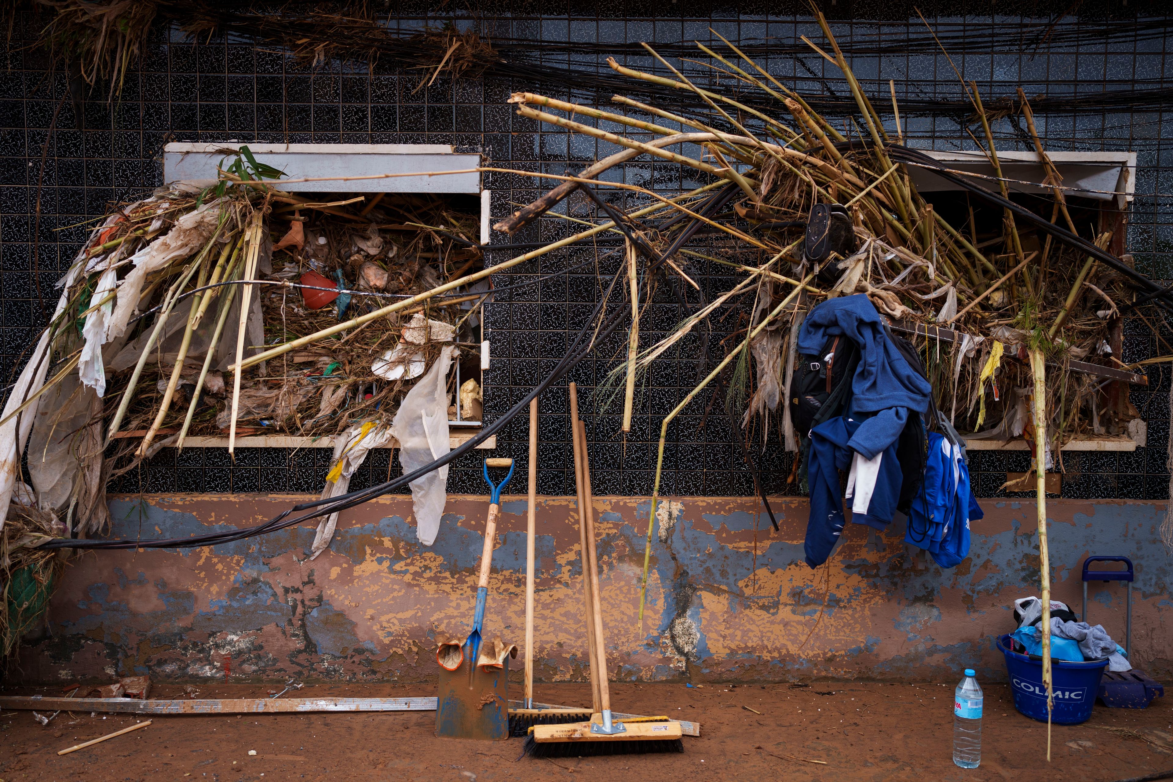 The windows of a house affected by floods are pictured in Paiporta, at the epicenter of the floods, near Valencia, Spain, Saturday, Nov. 2, 2024. (AP Photo/Manu Fernandez)