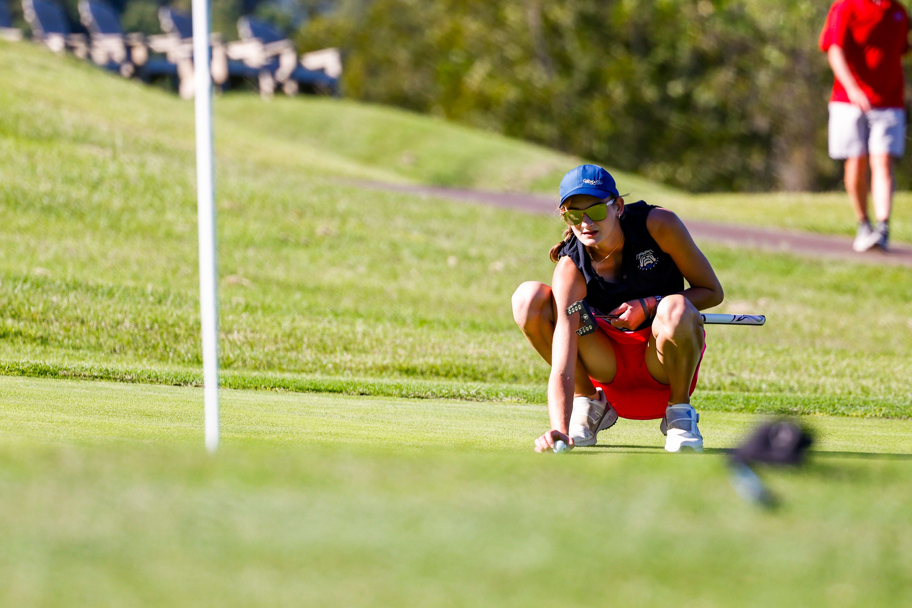 Notre Dame High School's Eliza Barnette lines up her ball for the put at Cape Girardeau Country Club on Wednesday October 2nd.