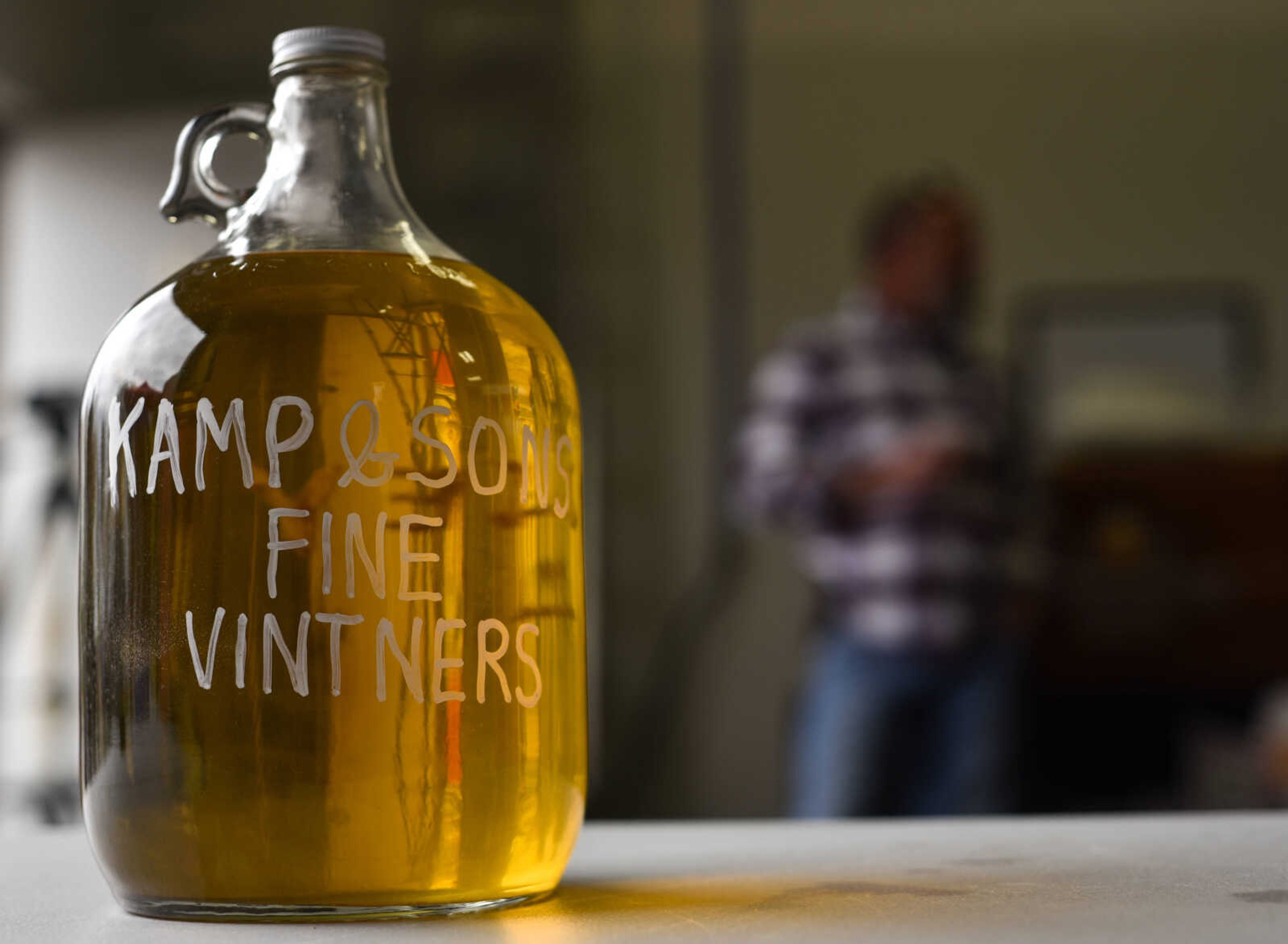 A jug containing last gallon of Fruitland resident Kerry Kamp's honeysuckle wine sits at the 9th annual Brew Movement Against Multiple Sclerosis held Saturday, March 24, 2018, in Jackson.