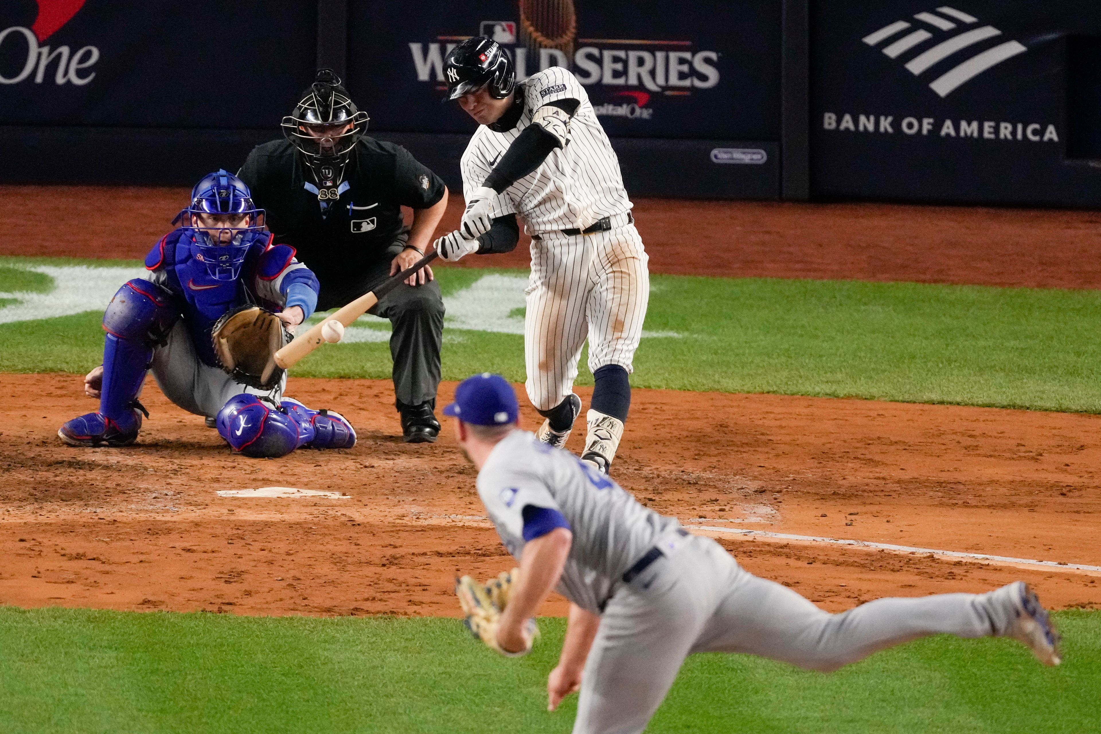 New York Yankees' Anthony Volpe hits a grand slam home run against the Los Angeles Dodgers during the third inning in Game 4 of the baseball World Series, Tuesday, Oct. 29, 2024, in New York. (AP Photo/Frank Franklin II)