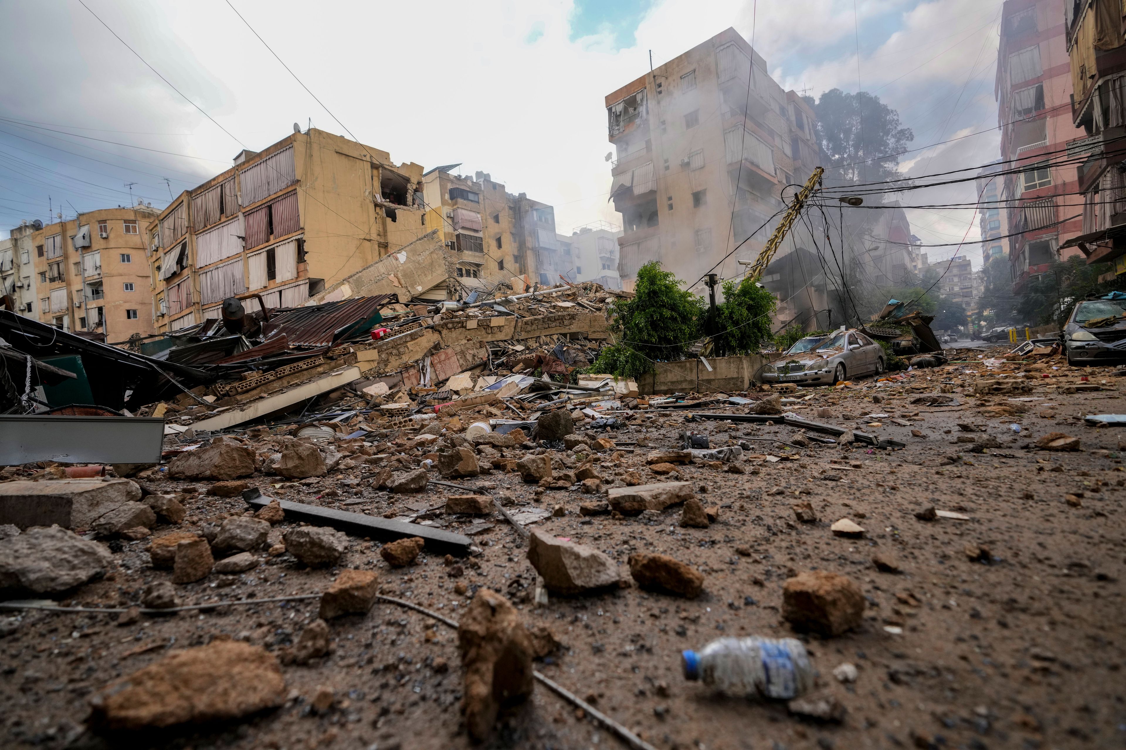 Smoke rises from the site of an Israeli airstrike in Beirut's southern suburb, Lebanon, Tuesday, Oct. 1, 2024. (AP Photo/Hassan Ammar)