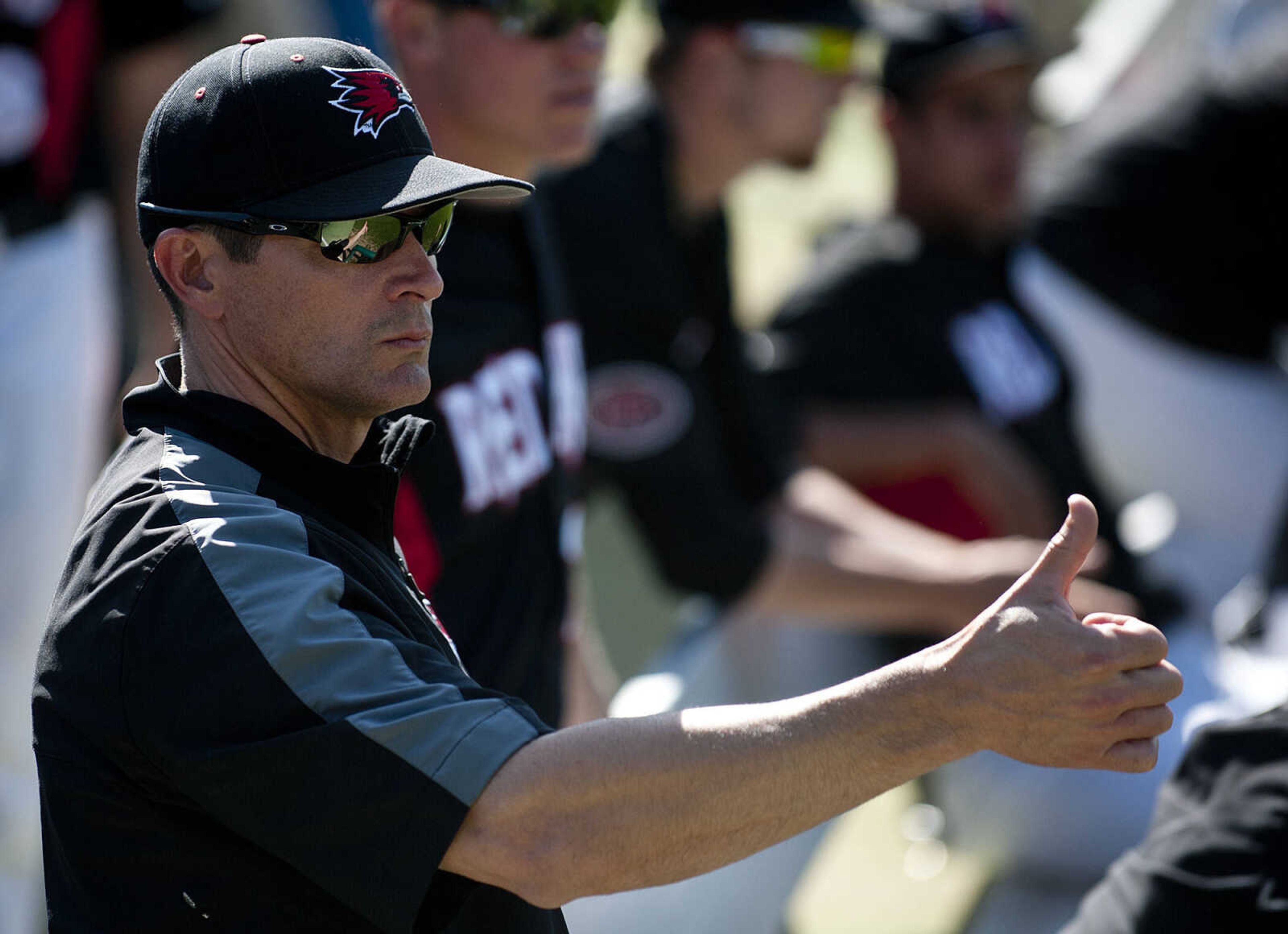 Southeast Missouri State coach Steve Bieser signals to a pitcher during a game at Capaha Field last season. (Adam Vogler)