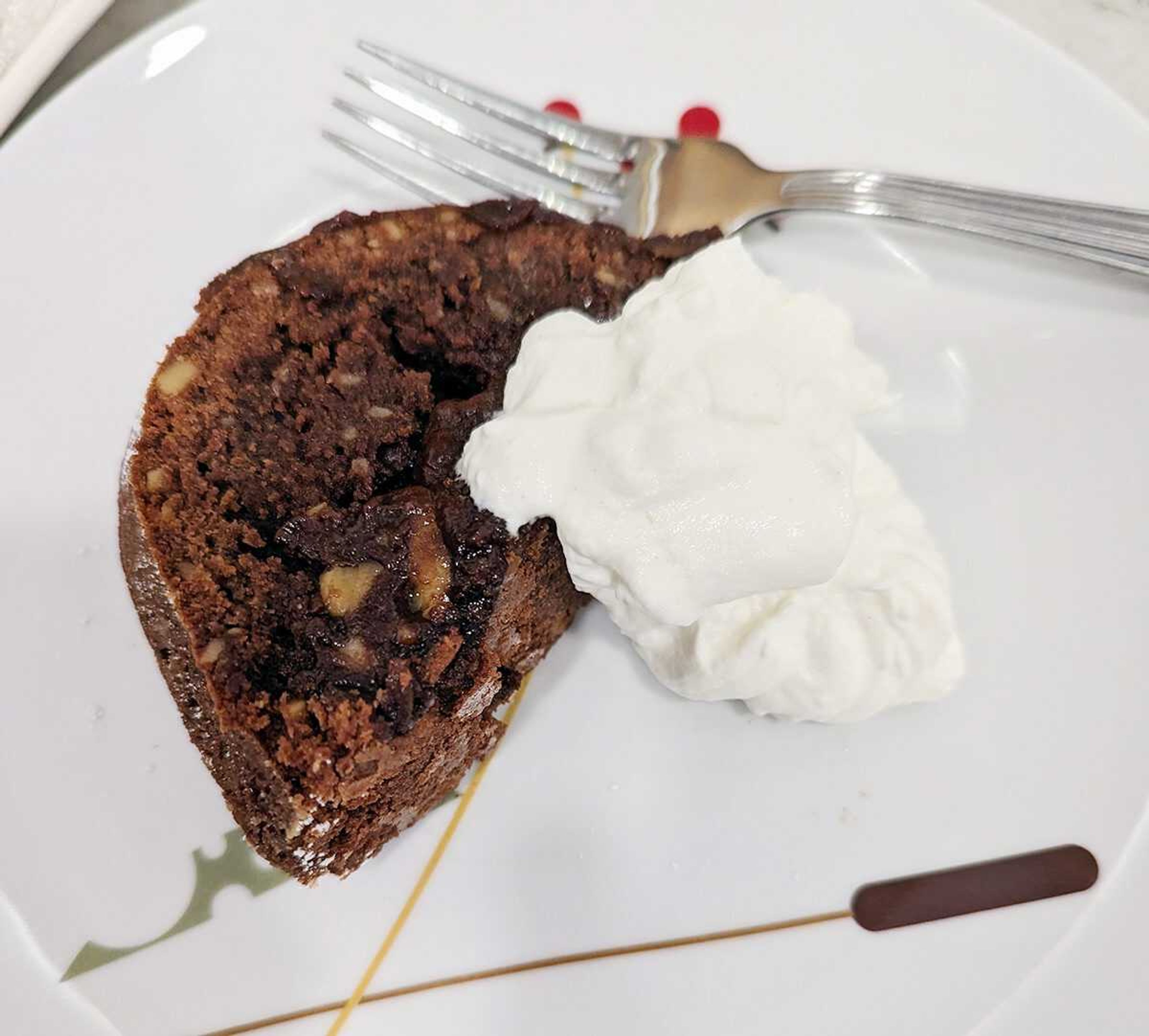 A slice of Tunnel of Fudge Cake, the most popular recipe ever in the history of the Pillsbury Bake Off and the cake that put the Bundt pan on the map.