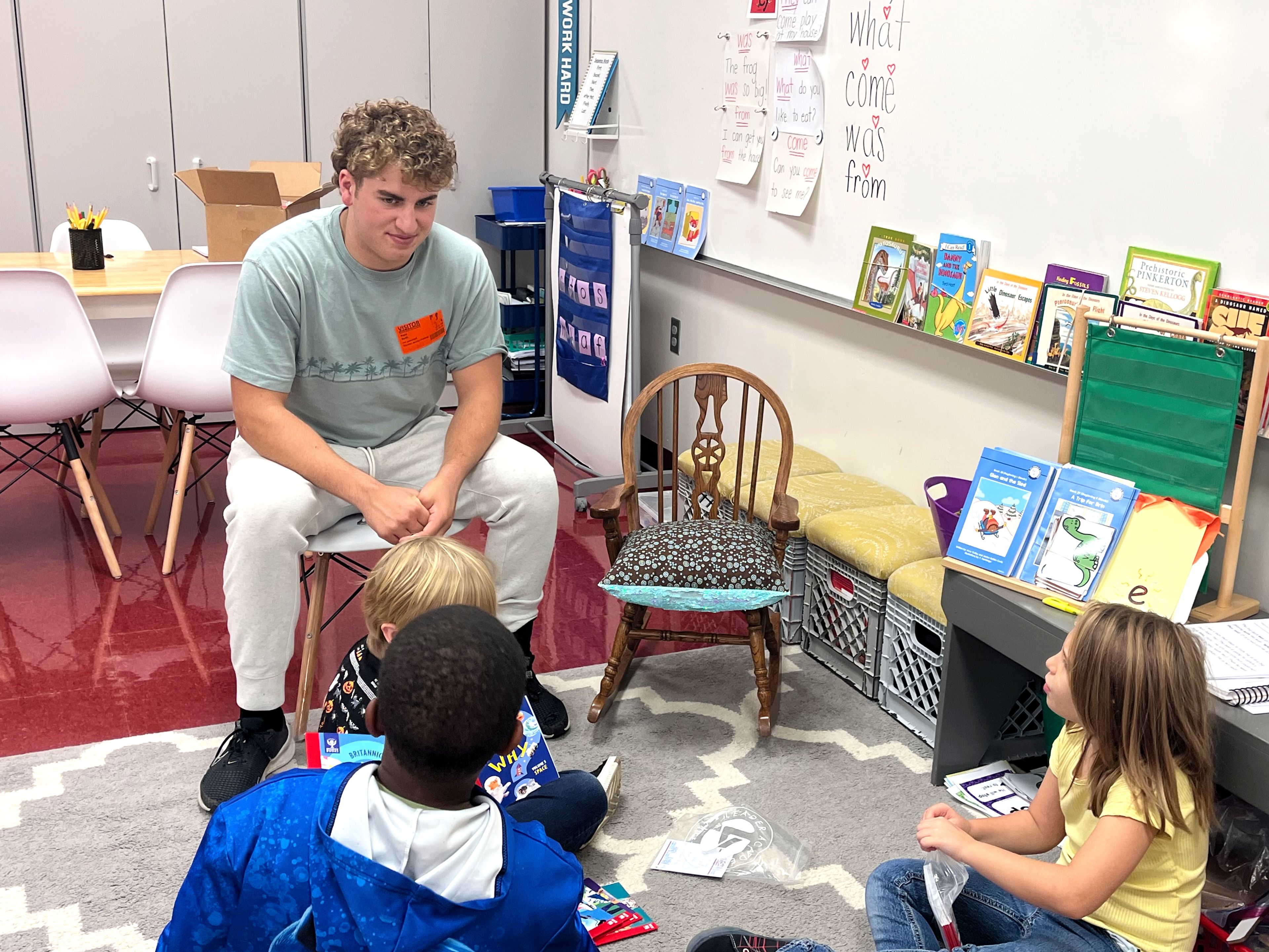 Cape Girardeau Central High School senior Nate Roth interacts with students Tuesday, Oct. 29, at Blanchard Elementary in Cape Girardeau as part of the Chick-fil-A Leader Academy's 1 Million Book Giveaway