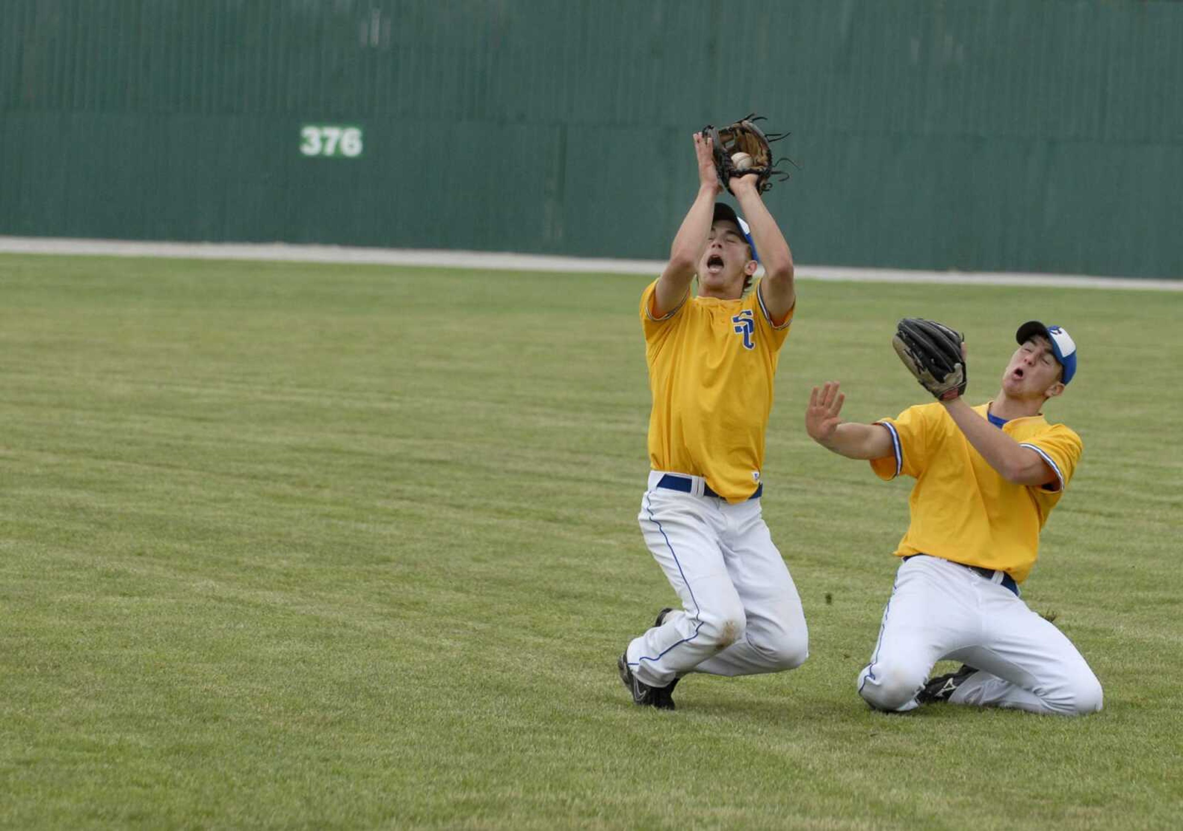 KIT DOYLE ~ kdoyle@semissourian.com
Scott City second baseman Josh Henson, left, caught a fly ball before colliding with right fielder Jake Campbell Wednesday, May 28, 2008, during the Class 2 Semifinal at Meador Park in Springfield.