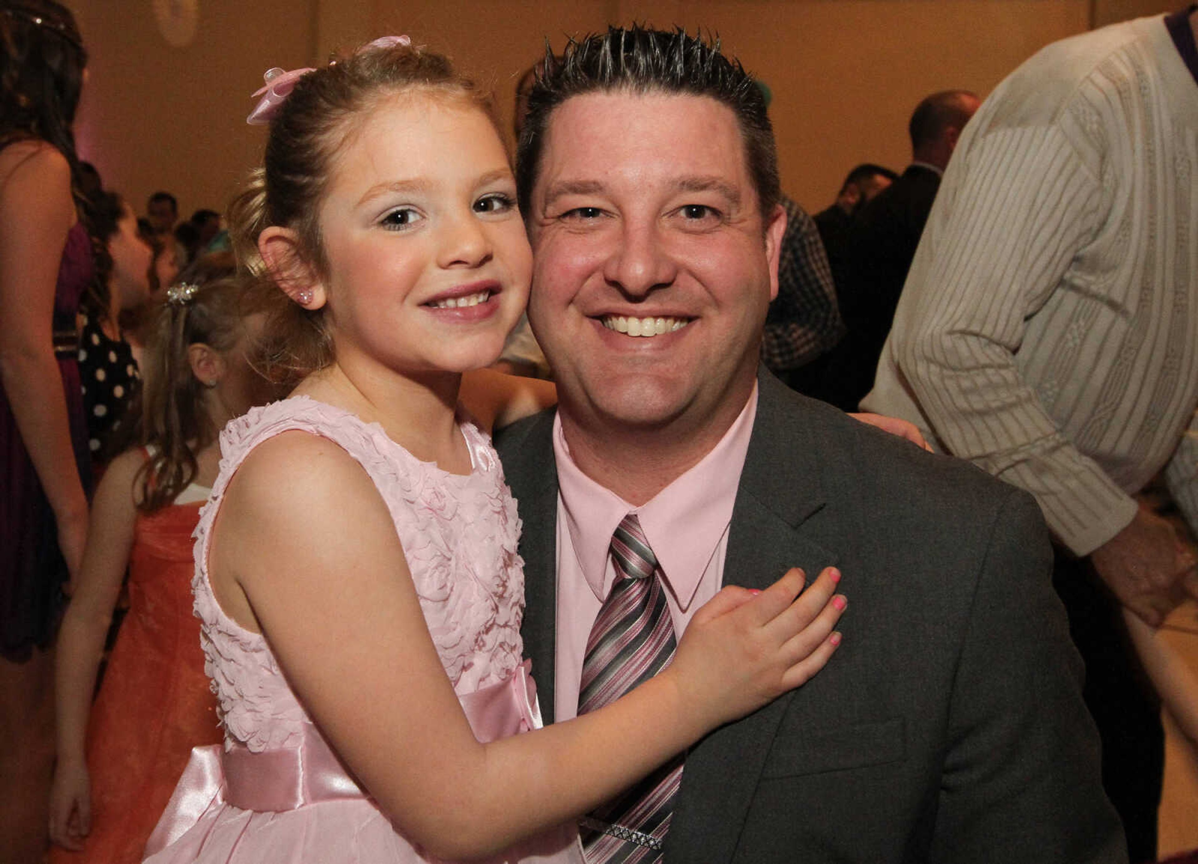 GLENN LANDBERG ~ glandberg@semissourian.com

Doug and Jacie Spooler pose for a photo during the 7th annual Father/Daughter Dance Saturday, Feb. 21, 2015 at the Osage Centre.