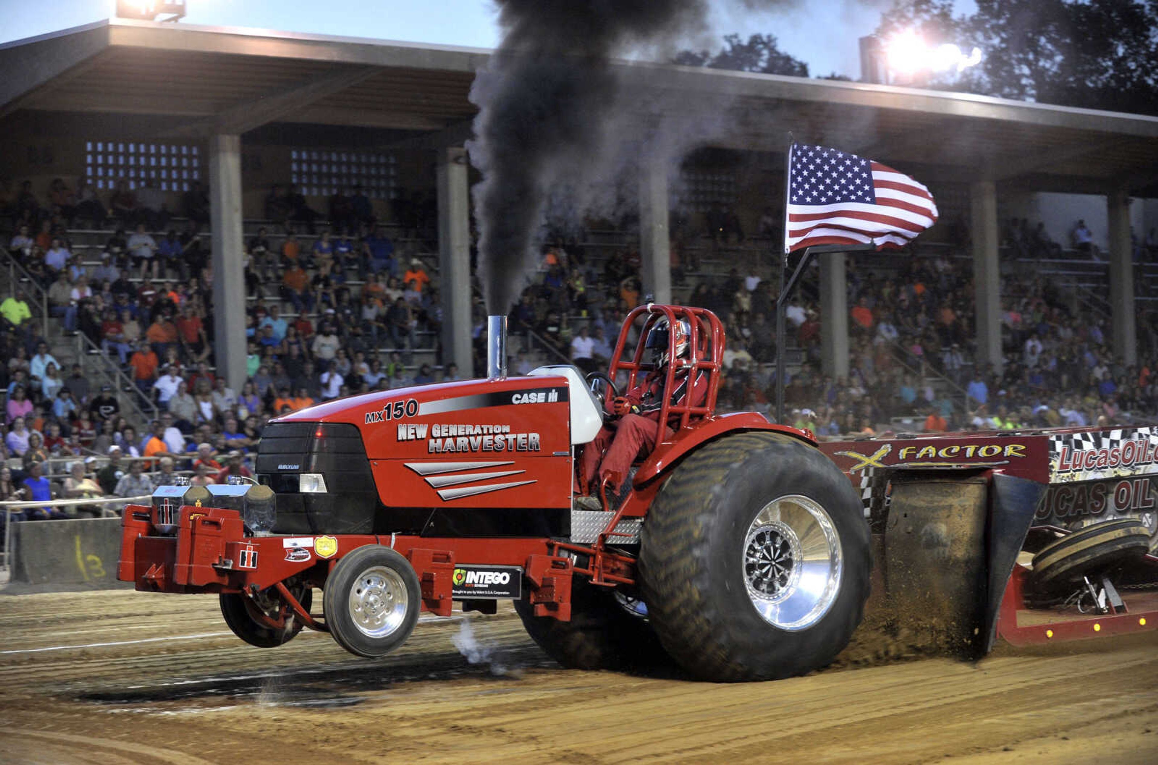 Ben Klott of Perryville drives his New Generation Harvester in the DeWitt Auction/D&S Salvage Hot Rod Truck and Tractor Pull on Sept. 15, 2017, at the SEMO District Fair in Cape Girardeau.