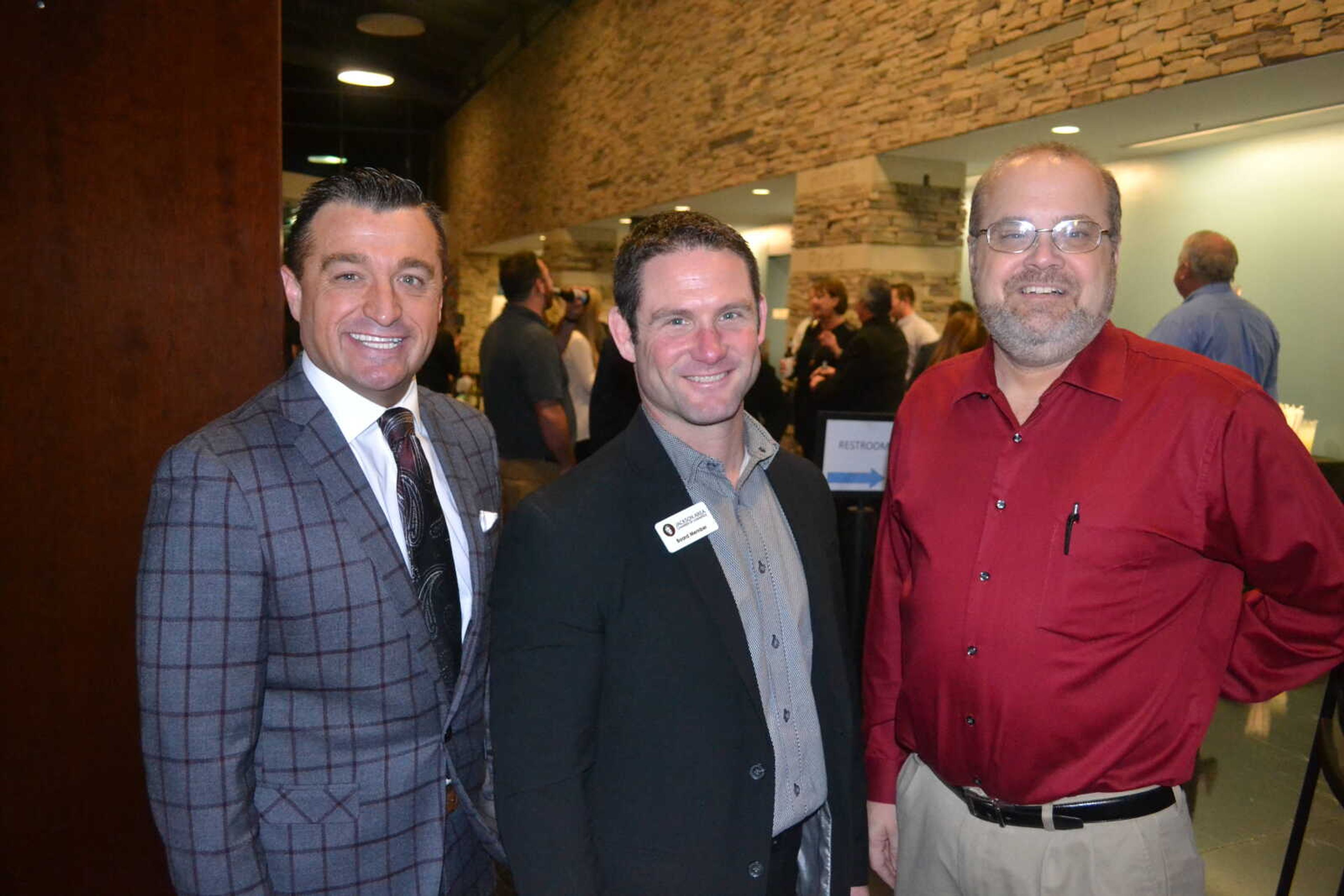 From left, Jackson Area Chamber of Commerce president Brian Gerau, Kyle Thompson and incoming chamber president Rob Stephens at&nbsp;the Jackson Area Chamber of Commerce's annual banquet and officer installation Jan. 10, 2020, at the Jackson Civic Center.