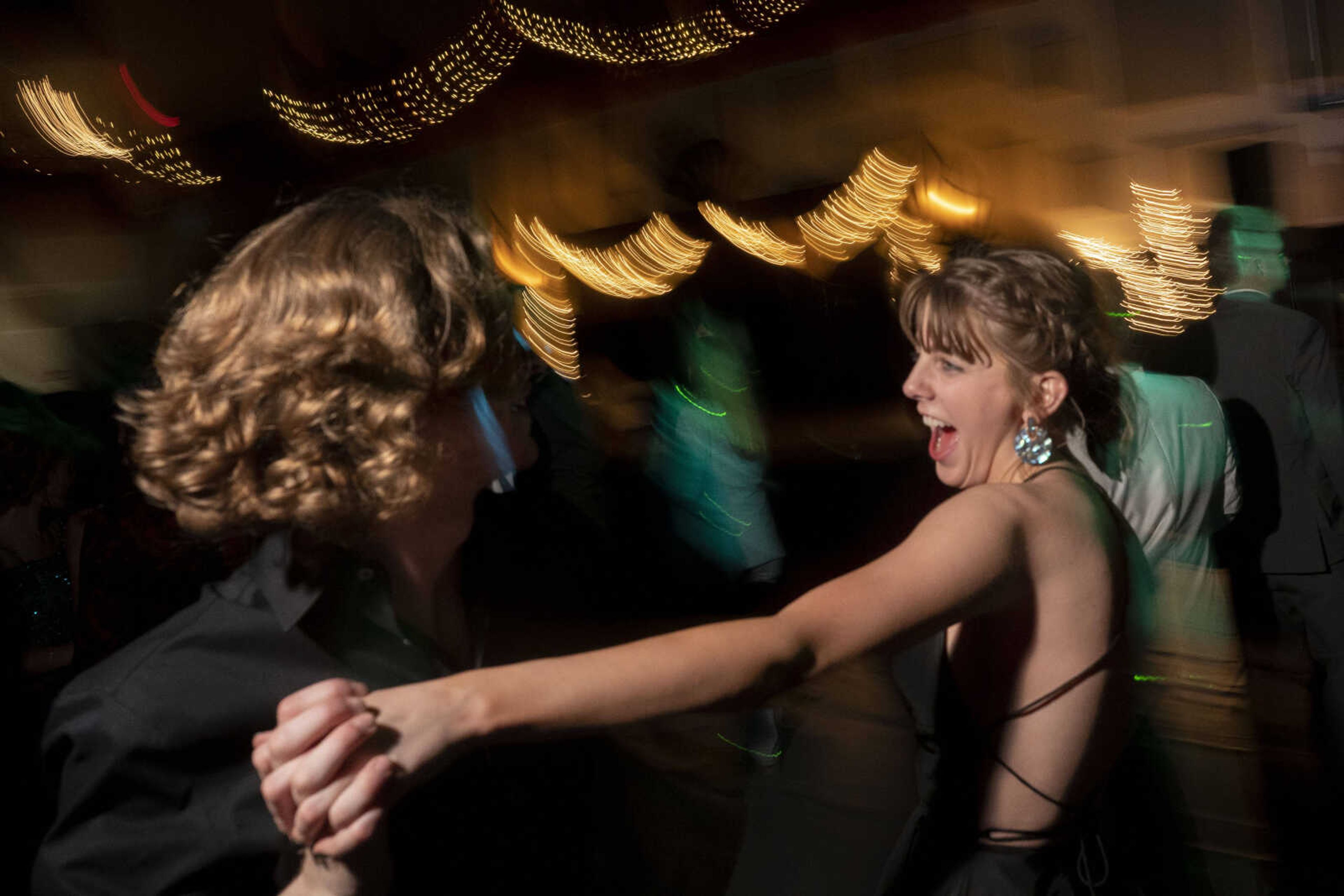 Emma Wilson, right, smiles while dancing with Dylan Alexander during prom Saturday, May 1, 2021 at Jackson High School.