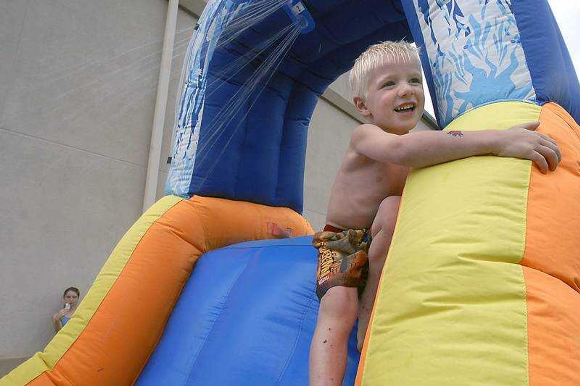 KIT DOYLE ~ kdoyle@semissourian.com
Three-year-old Jarid Cowell called to his family before heading down a water slide Thursday during the eighth annual Parks and Rec Day at the Osage Community Centre.