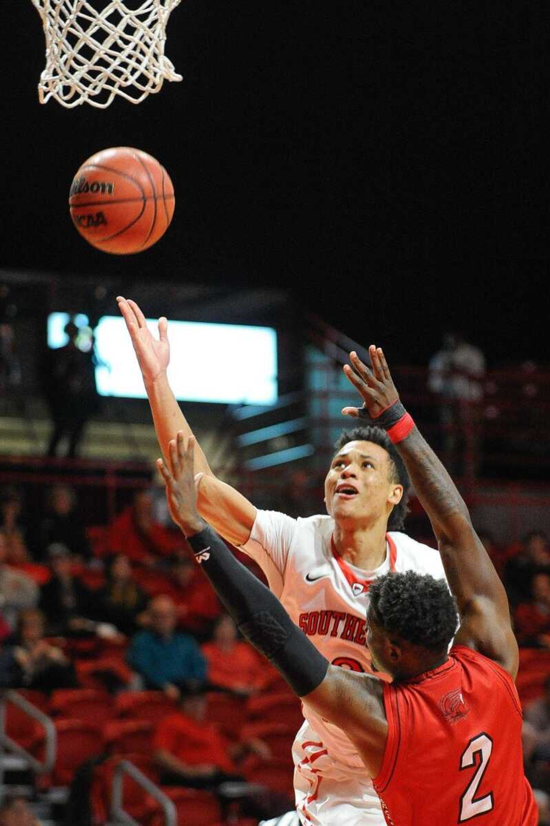 Southeast Missouri State's Eric McGill shoots over Jacksonville State's Jaquail Townser in the first half Wednesday, Jan. 13, 2016 at the Show Me Center. (Glenn Landberg)