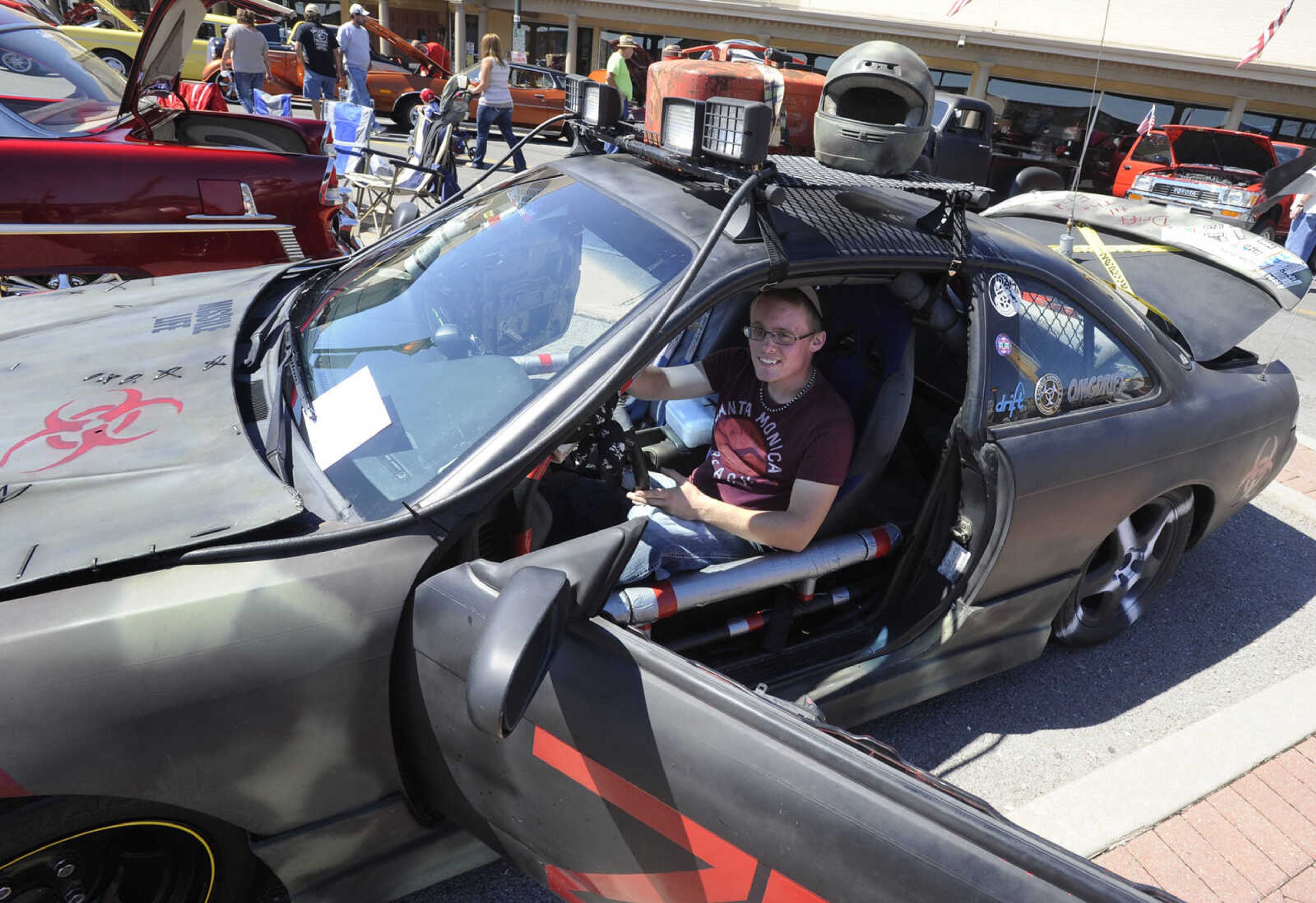 D.J. Brown of Whitewater shows his 1995 Nissan 240 "drift car" at the River Tales Classic Car Show on Sunday, Sept. 14, 2014 in Cape Girardeau.