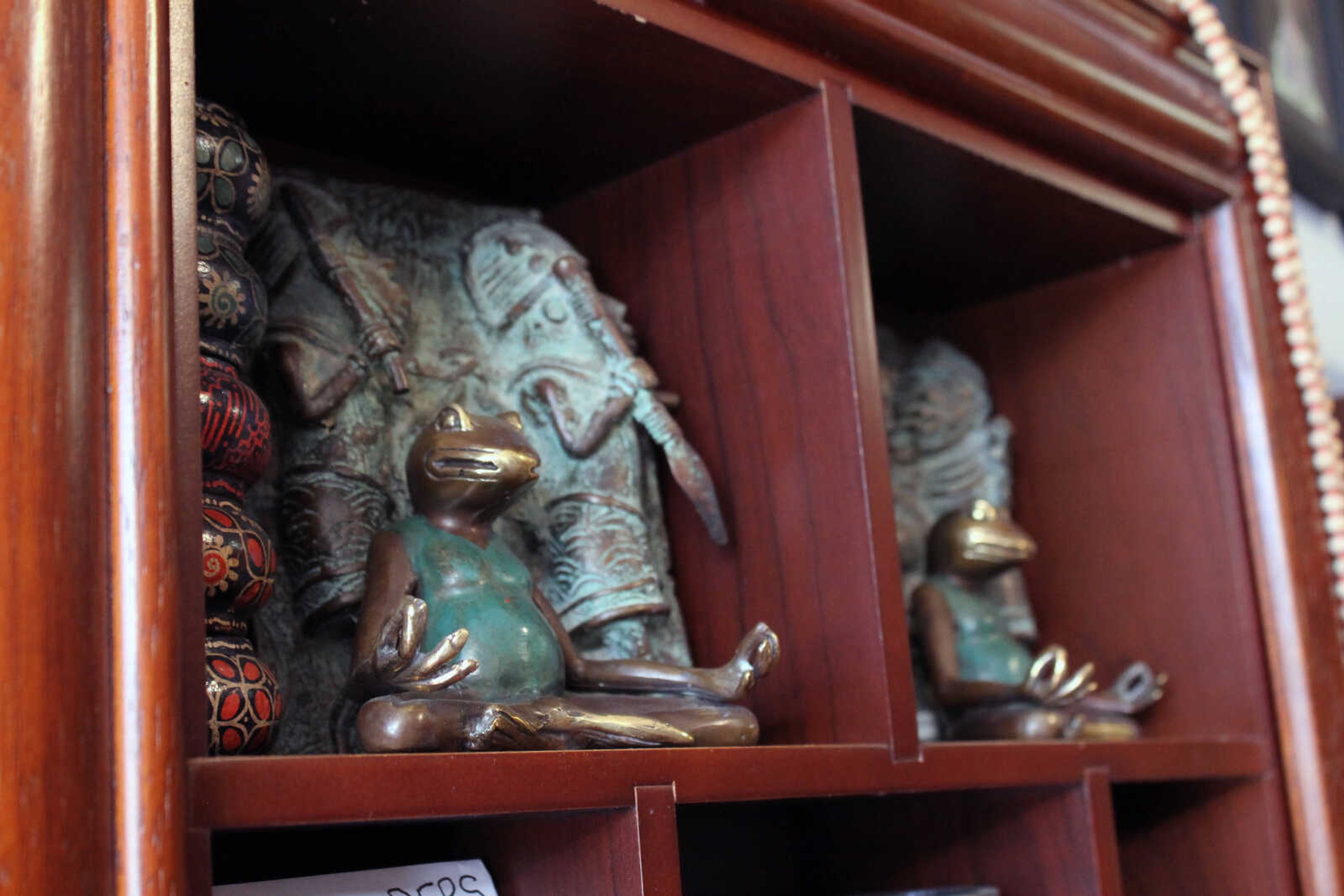 Emily Priddy ~ epriddy@semissourian.com
A metal frog meditates in lotus position Friday, March 10, 2017, at Makanda Trading Company in Makanda, Illinois.