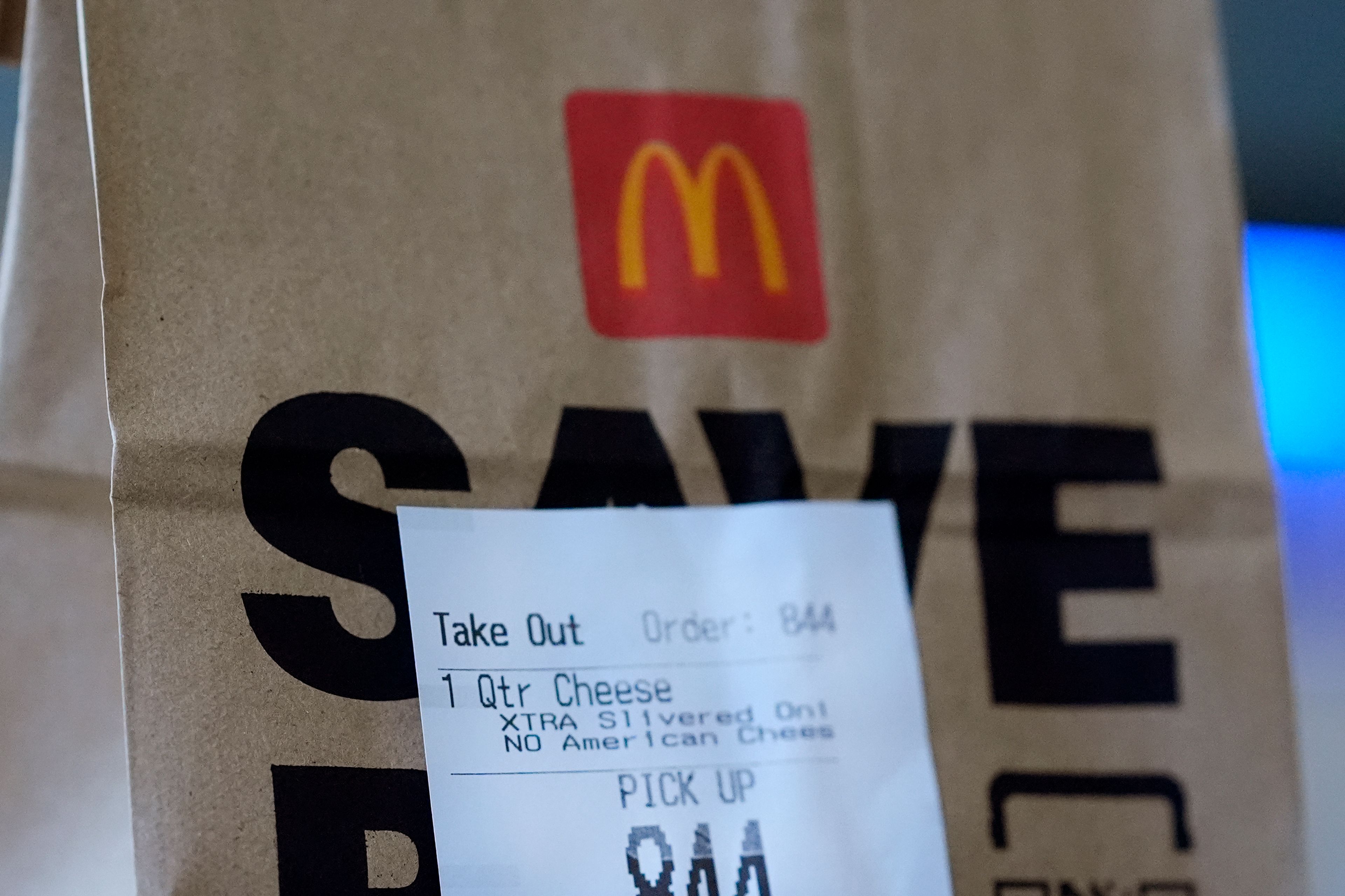 Pictured is a McDonald's bag with an order for a Quarter Pounder sandwich purchased Wednesday, Oct. 23, 2024, in Chicago. (AP Photo/Charles Rex Arbogast)