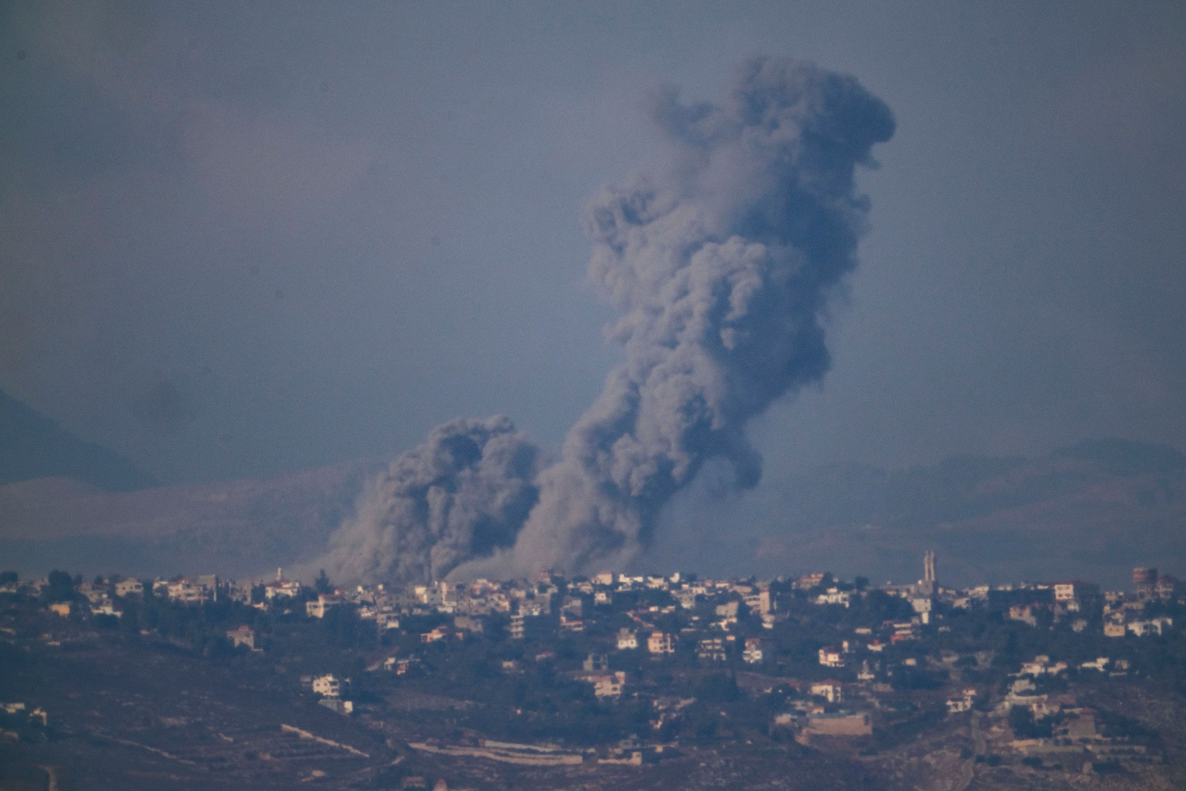 Smoke rises following Israeli bombardment in southern Lebanon as seen from northern Israel, Thursday, Oct. 17, 2024. (AP Photo/Leo Correa)