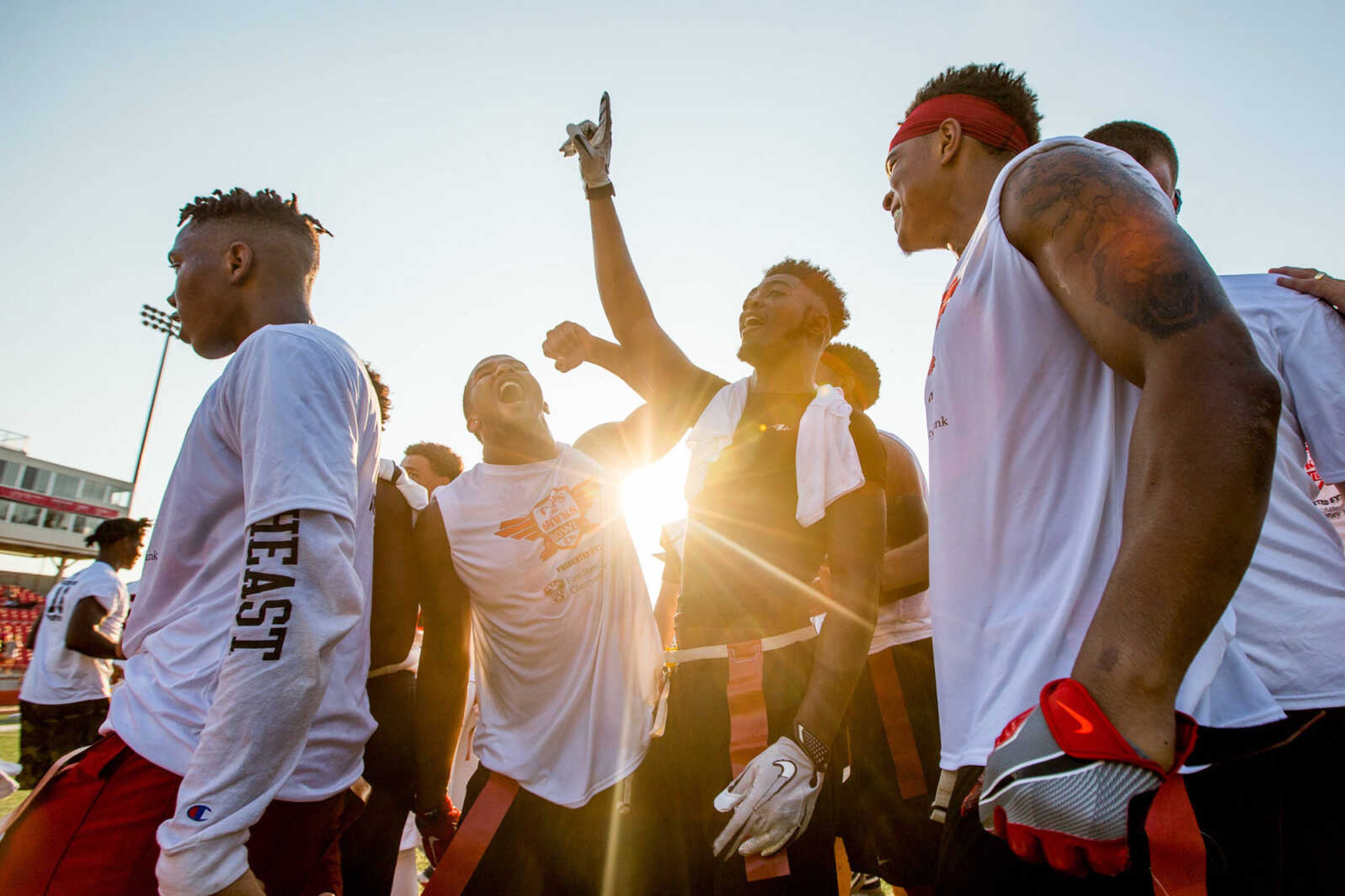 GLENN LANDBERG ~ glandberg@semissourian.com



Southeast Missouri State University football players celebrate after winning the Cops and Hawks Bowl Thursday, July 21, 2016 at Houck Stadium. The flag-football game was a fundraiser for the family members of those who have lost their lives in the line of duty.