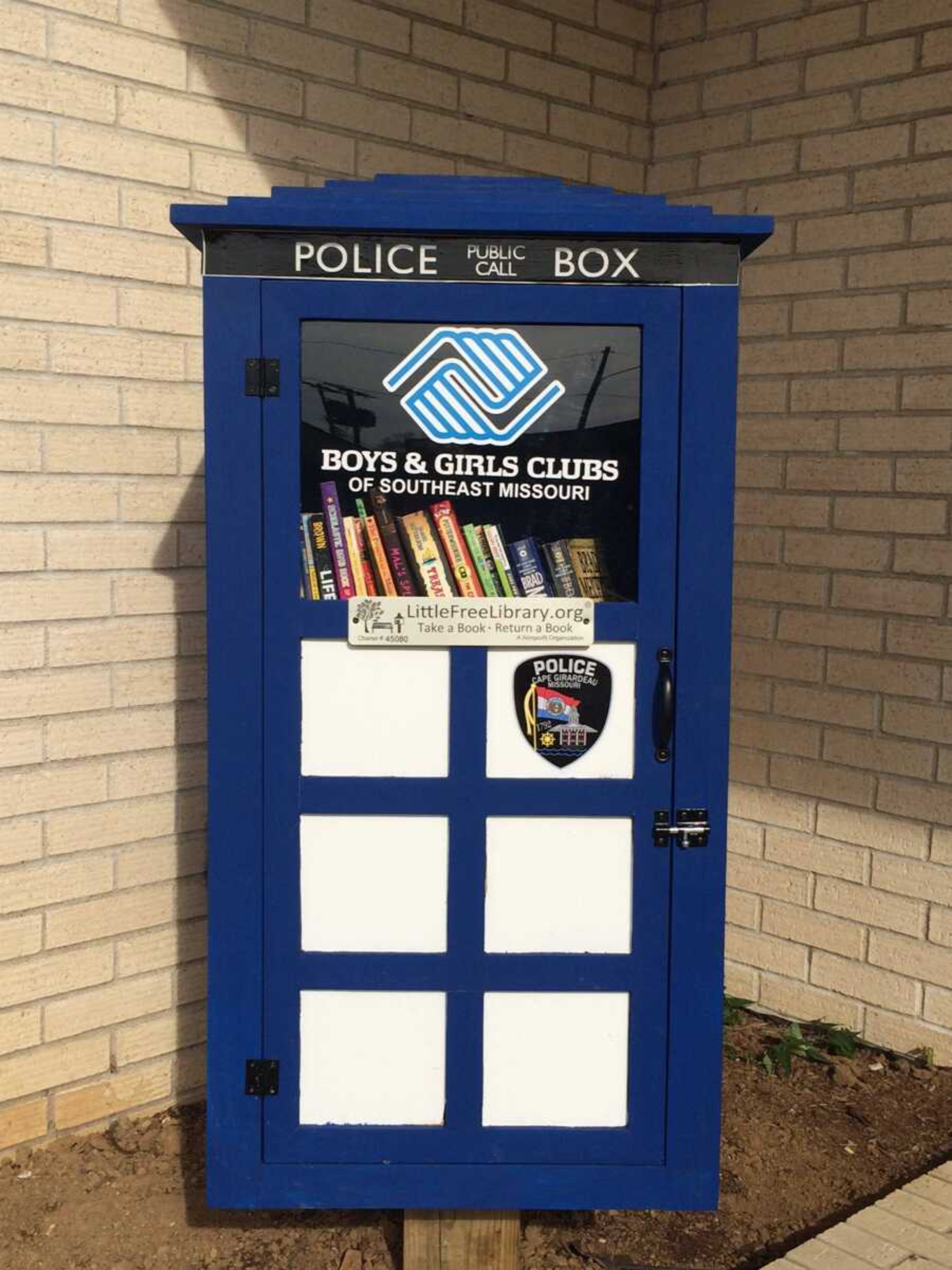 A Little Free Library waits to transport users' imaginations through time and space outside the Cape Girardeau Police Department, 40 S. Sprigg St. The library is designed to resemble the TARDIS, the title character's time-traveling spaceship from the popular television show "Doctor Who."