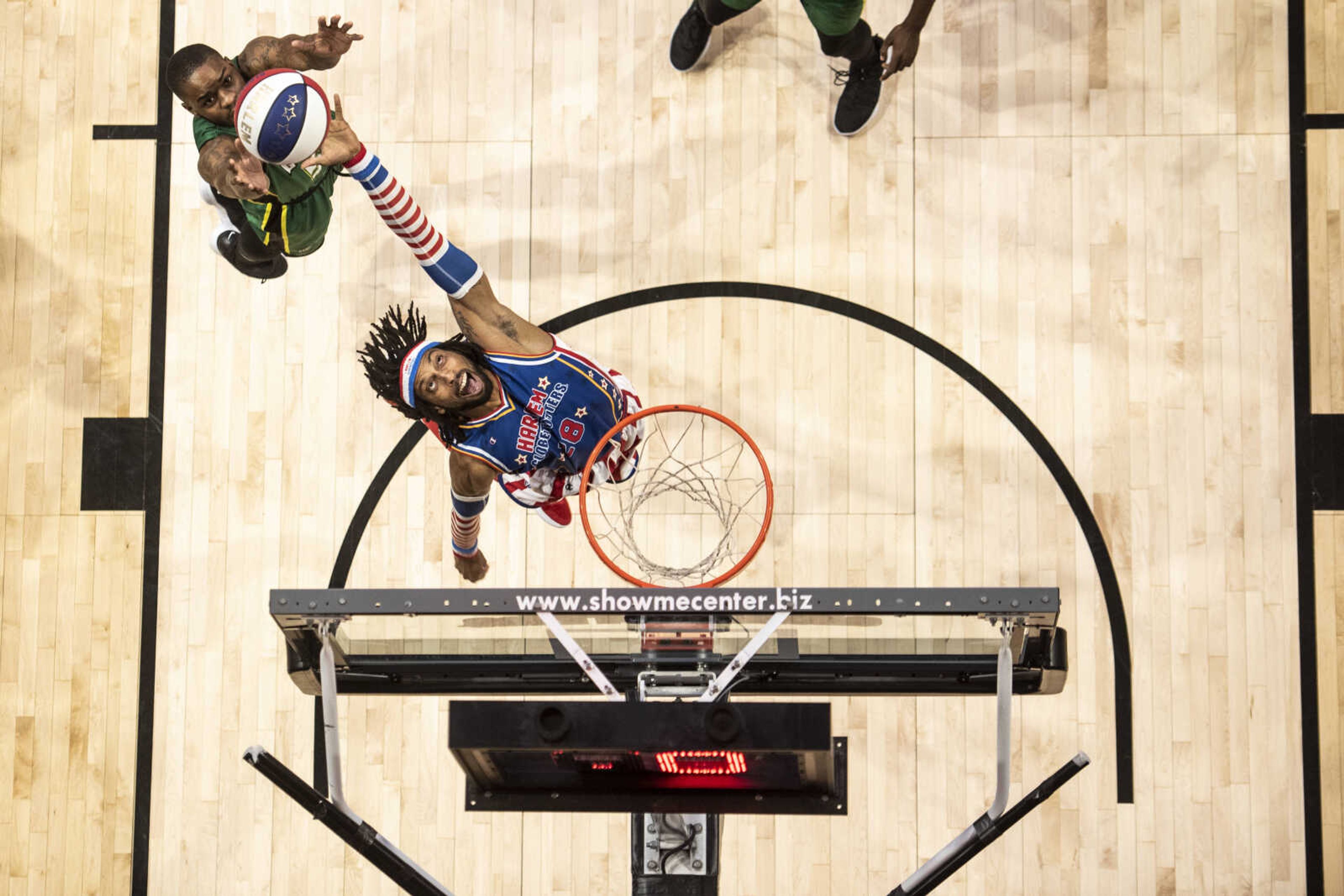 Harlem Globetrotters' "Sky" (28) reaches for the ball in an attempt to dunk against the Washington Generals during their matchup at the Show Me Center Wednesday, Jan. 16, 2019, in Cape Girardeau.