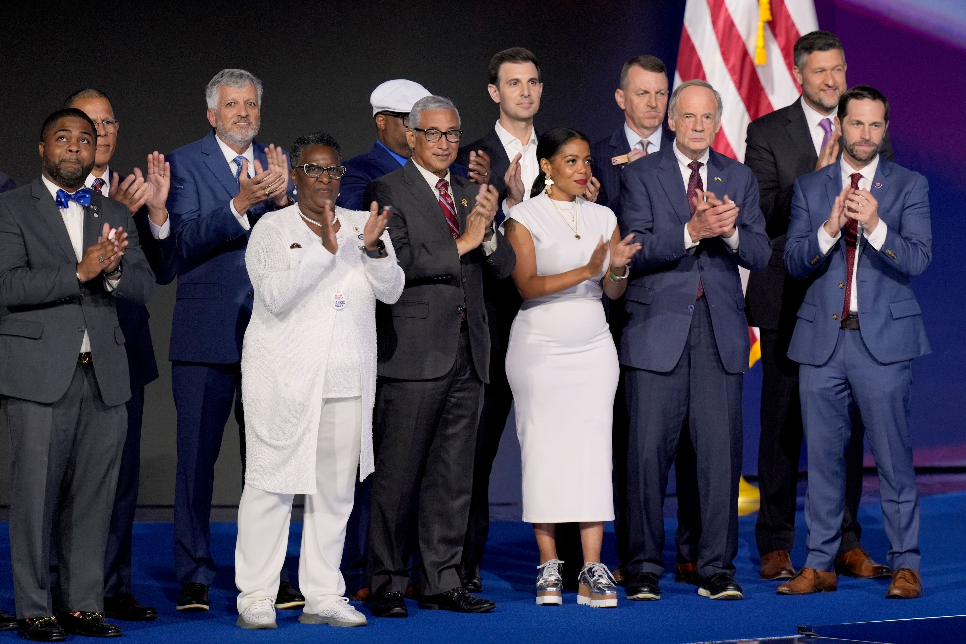 Democratic veterans serving in local, state and federal levels of government stand alongside Rep. Ruben Gallego, D-Ariz., during the Democratic National Convention Thursday, Aug. 22, 2024, in Chicago. (AP Photo/J. Scott Applewhite)