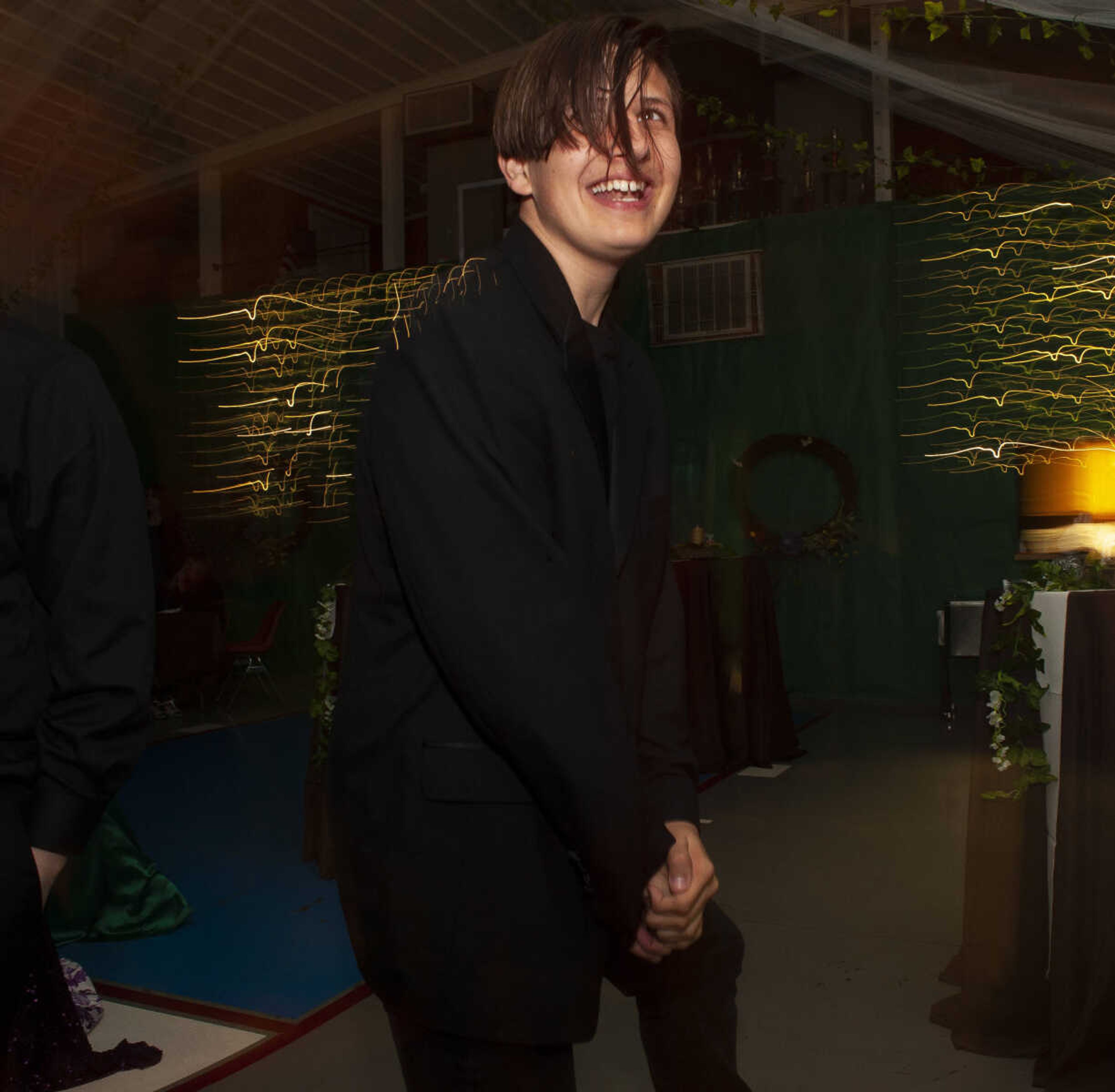 Delta freshman Elijah Dickman dances during Delta High School's prom on Saturday, April 13, 2019, at the Delta Community Center.