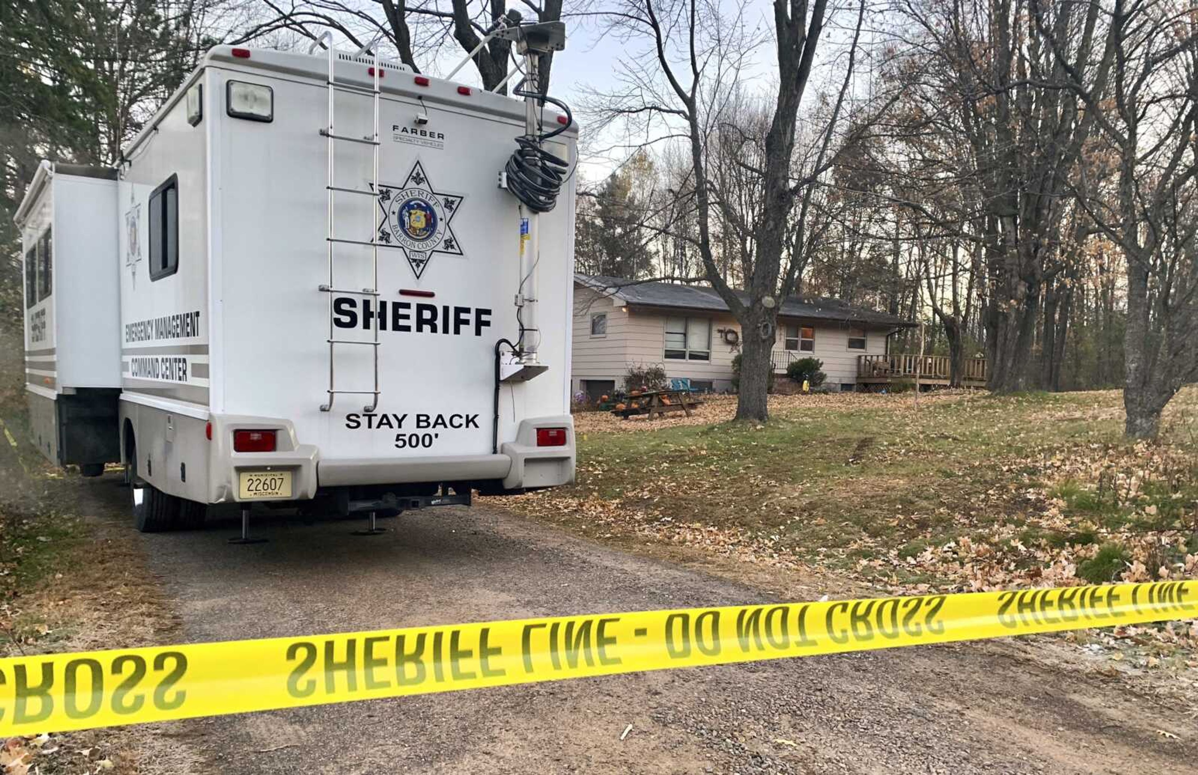 A Barron County, Wisconsin, sheriff's vehicle is parked outside the home where James Closs and Denise Closs were found fatally shot Oct. 15. The Barron County Sheriff's Department said on its Facebook page the missing teenager Jayme Closs was found alive Thursday and a suspect was taken into custody.