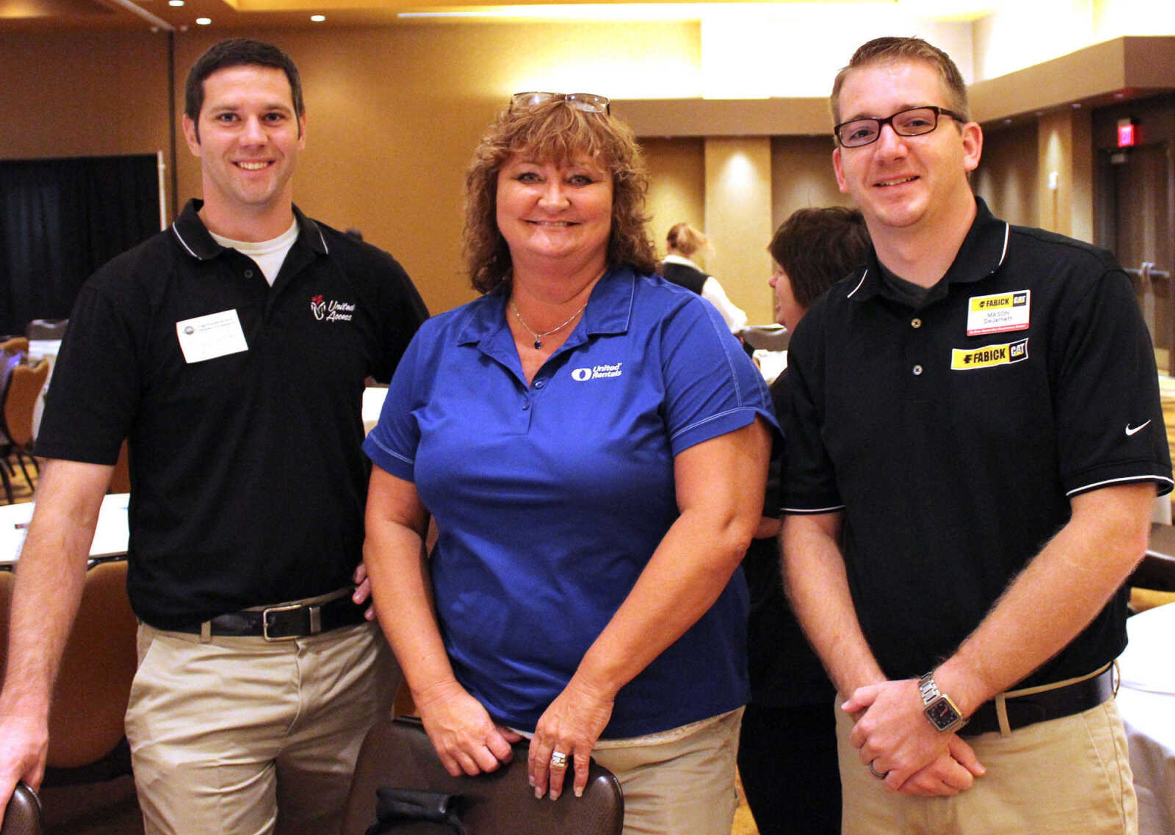 Michael VanOordt, left, United Access; Kathy Kraemer, United Rental; Mason DeJarnett, Fabick Cat.