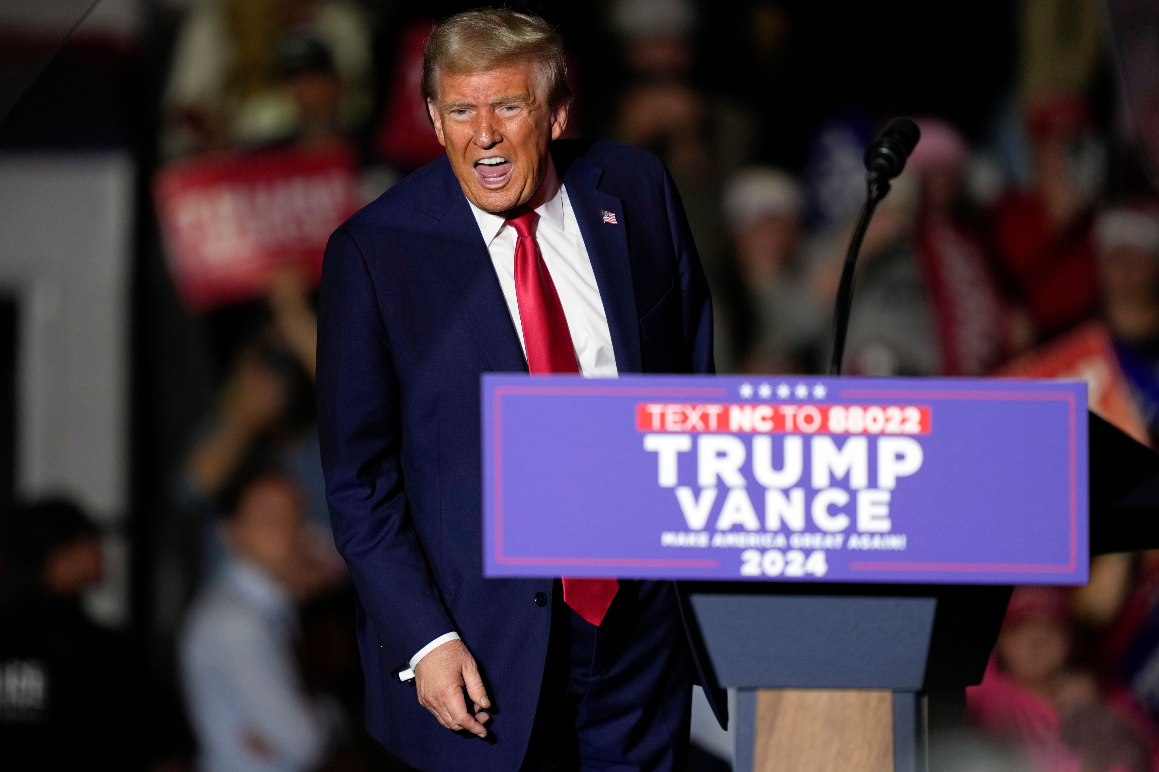 Republican presidential nominee former President Donald Trump shouts after speaking at a campaign rally at Williams Arena at Mignes Coliseum, Monday, Oct. 21, 2024, in Greenville, N.C. (AP Photo/Julia Demaree Nikhinson)