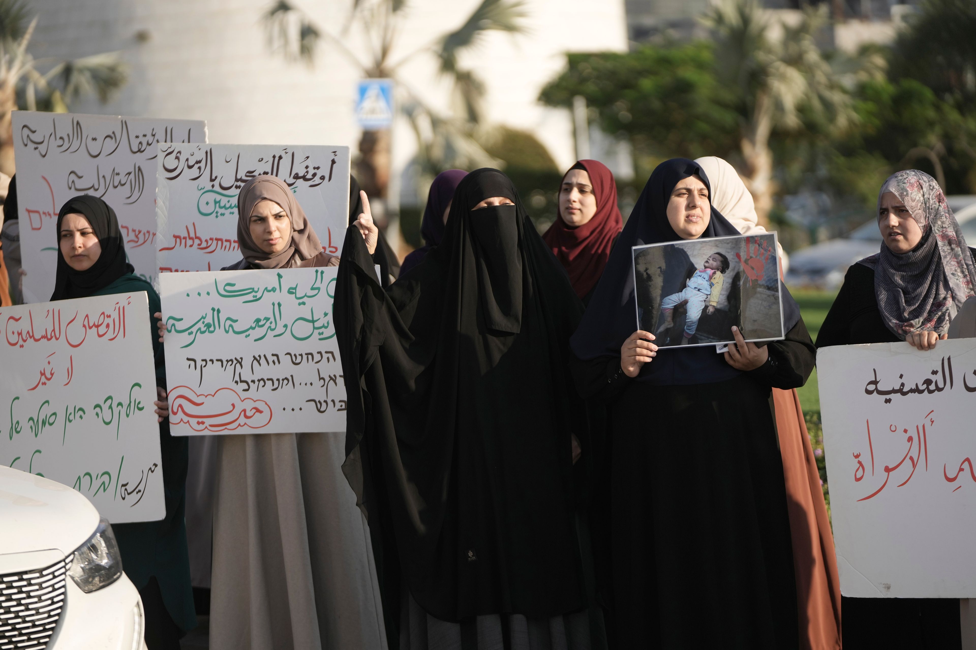 Palestinian citizens of Israel protest against Israel's military operations in the Gaza Strip and Lebanon, in Umm Al-Fahm, Israel, Saturday, Nov. 9, 2024. (AP Photo/Mahmoud Illean)