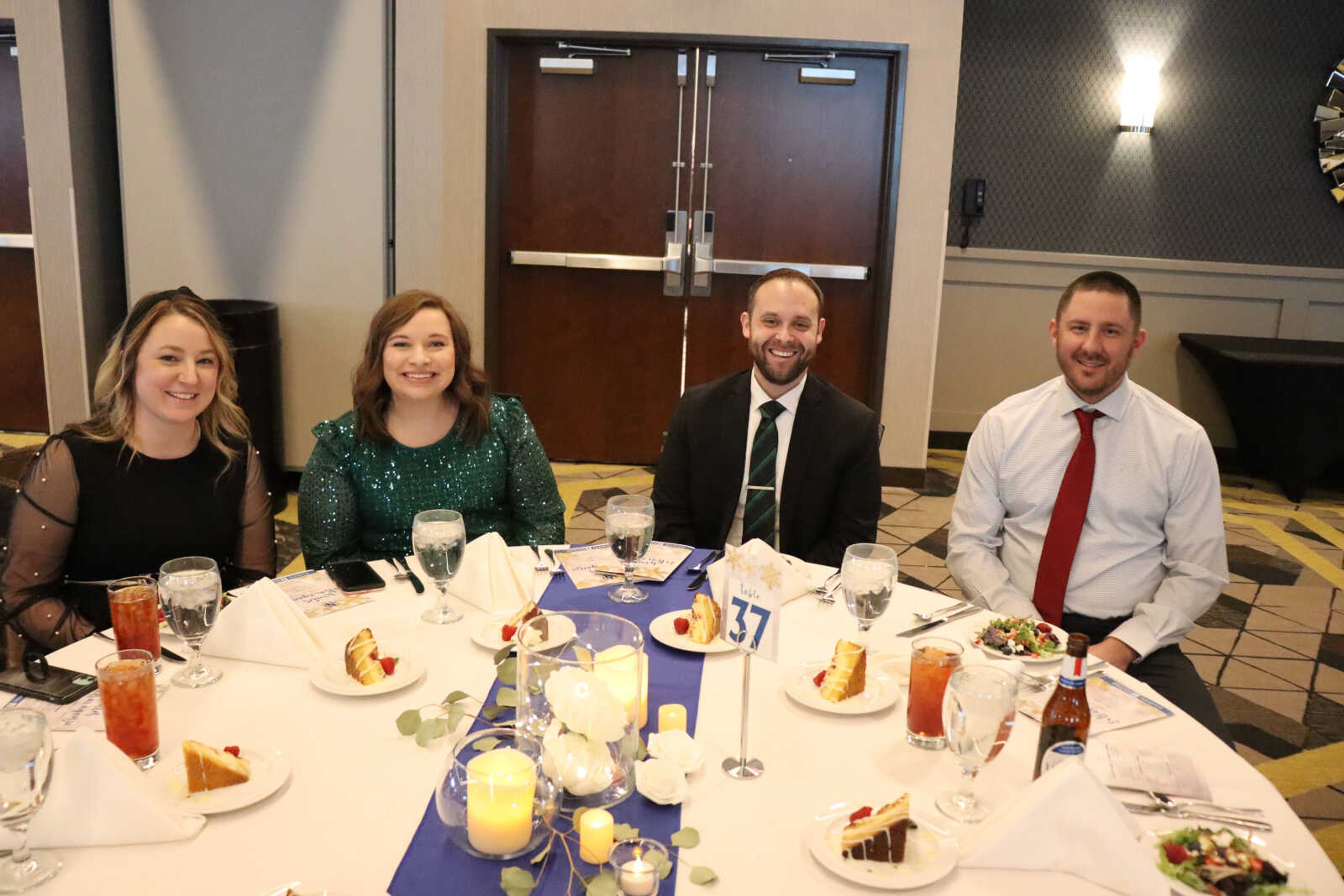 (Left to right) Kayli Naramore, Ciara Joplin, Eric Joplin and Cody Naramore smile for the camera, while keeping up with their friends.