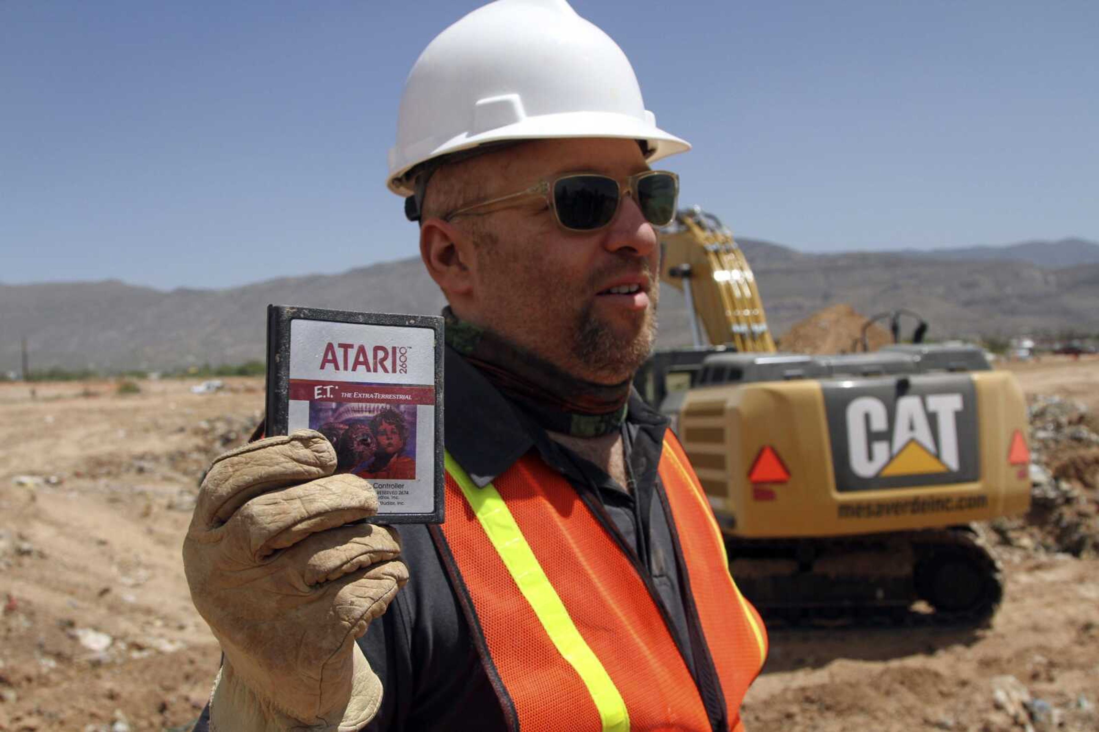 Film director Zak Penn shows a decades-old Atari &#8220;E.T. the Extra-Terrestrial&#8221; game found Saturday in a dumpsite in Alamogordo, N.M.<br>Juan Carlos Llorca<br>Associated Press