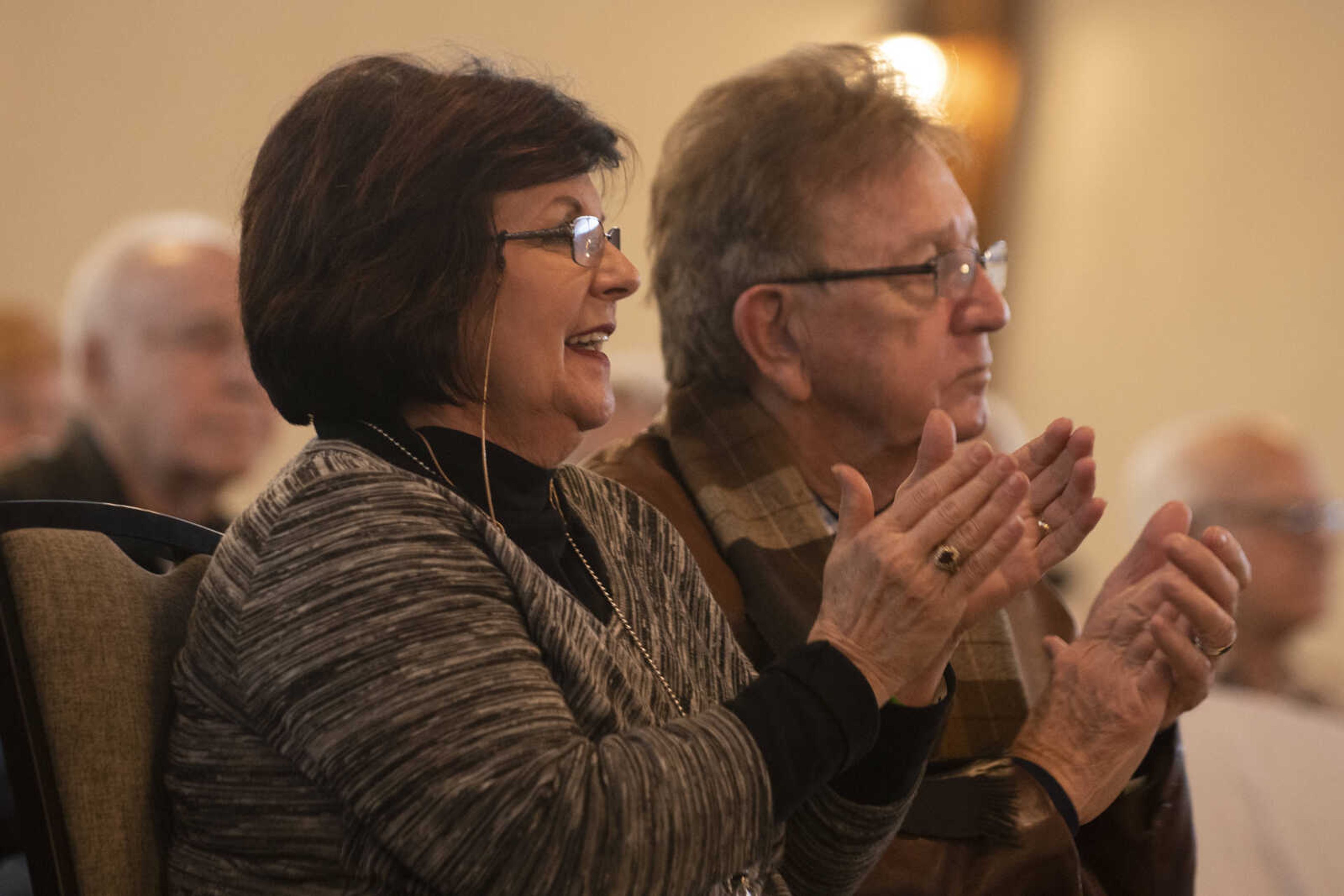 Dianne and Kerry Baugher of Cape Girardeau clap for the music of The Baker Family at the Bootheel Bluegrass Festival on Friday, Jan. 25, 2019, at the Bavarian Halle in Fruitland. The festival continues Saturday with more bluegrass.