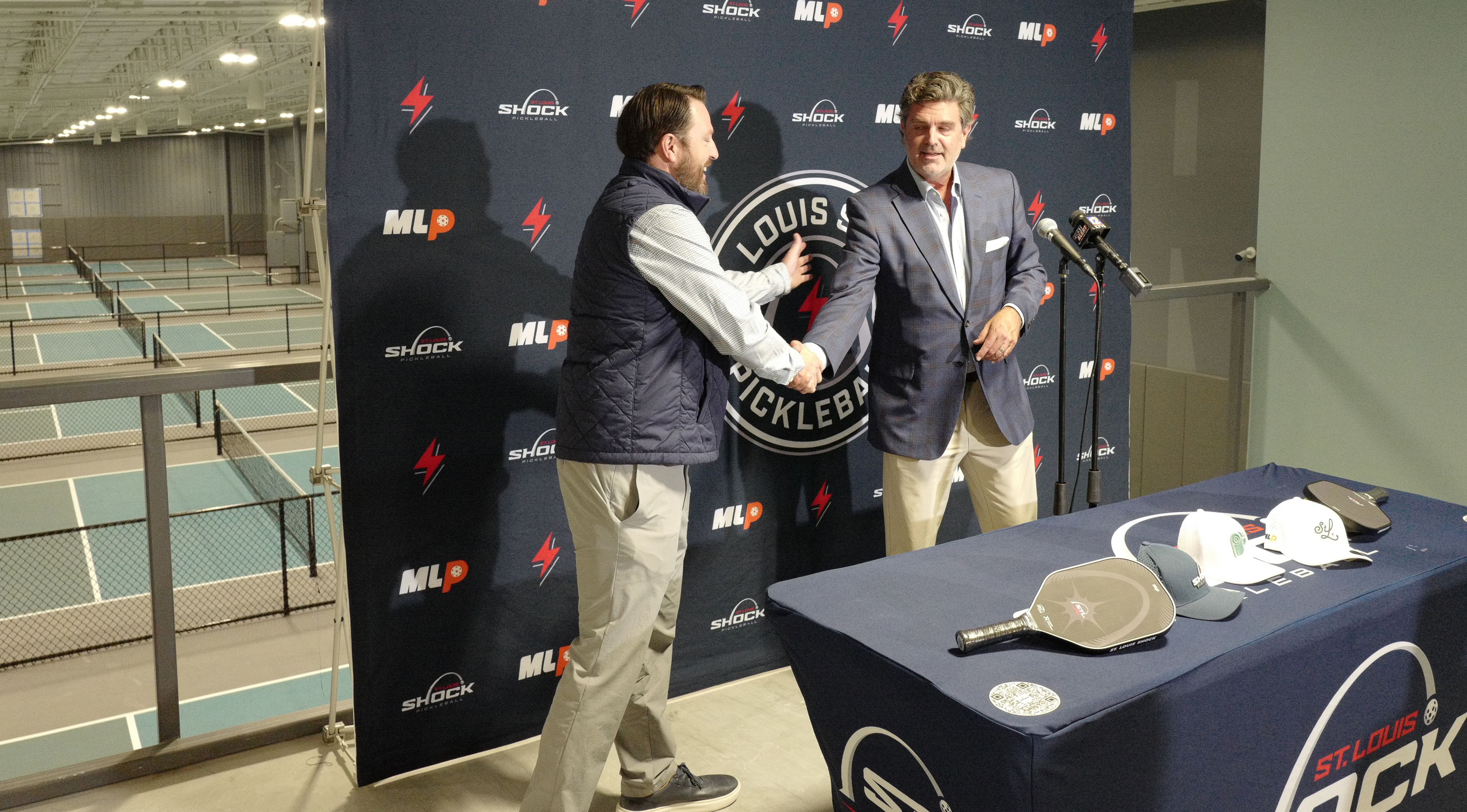 Andrew Haines, left, shakes Jeff Brune's hand at The Pickleball Factory and St. Louis Shock news event on Wednesday, Nov. 20, in Cape Girardeau. The two had met earlier in the year and began discussing ways to collaborate when it came to promoting pickleball.