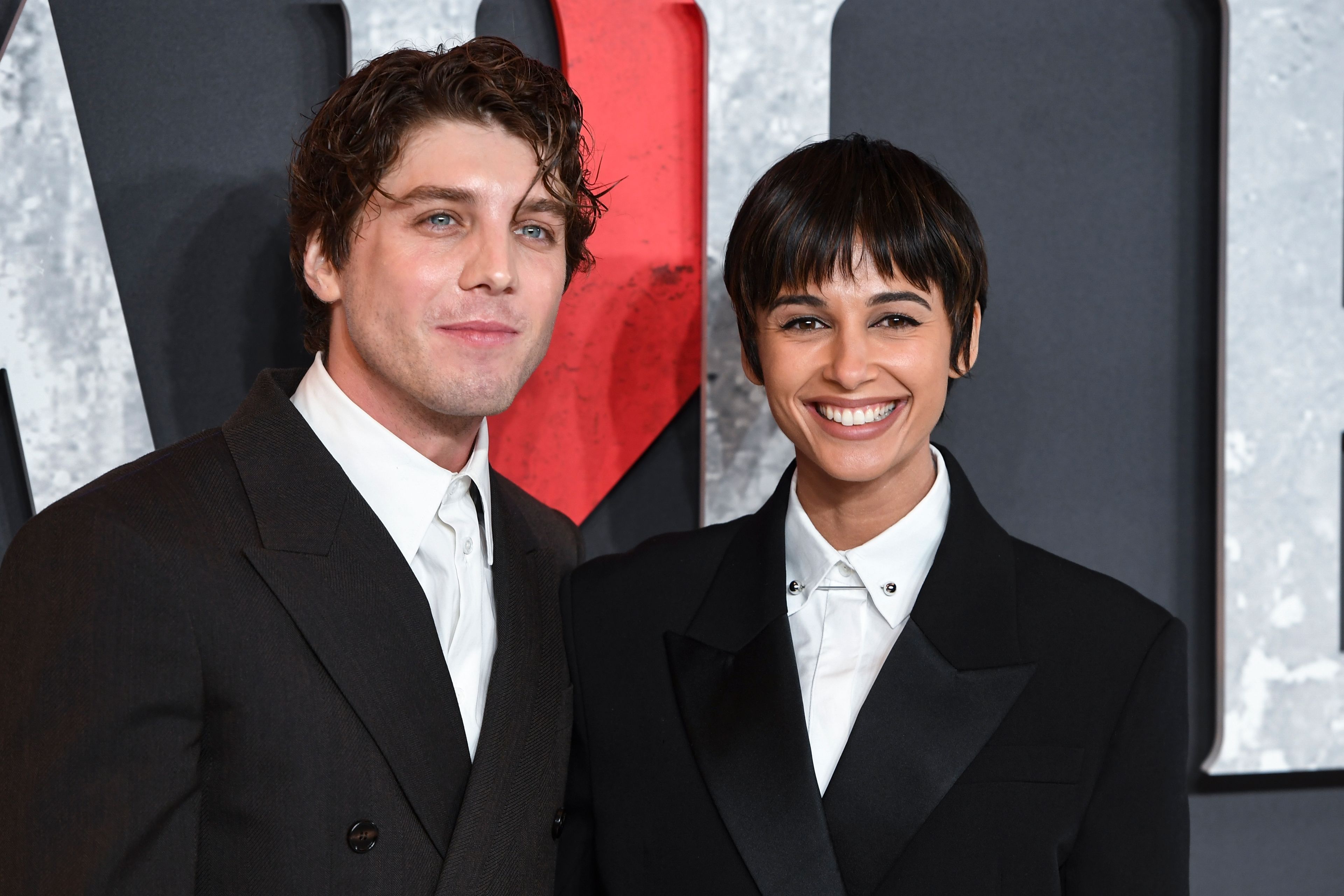 Lukas Gage, left, and Naomi Scott pose for photographers upon arrival at the premiere for the film 'Smile 2' on Tuesday, Oct. 8, 2024, in London. (Photo by Thomas Krych/Invision/AP)