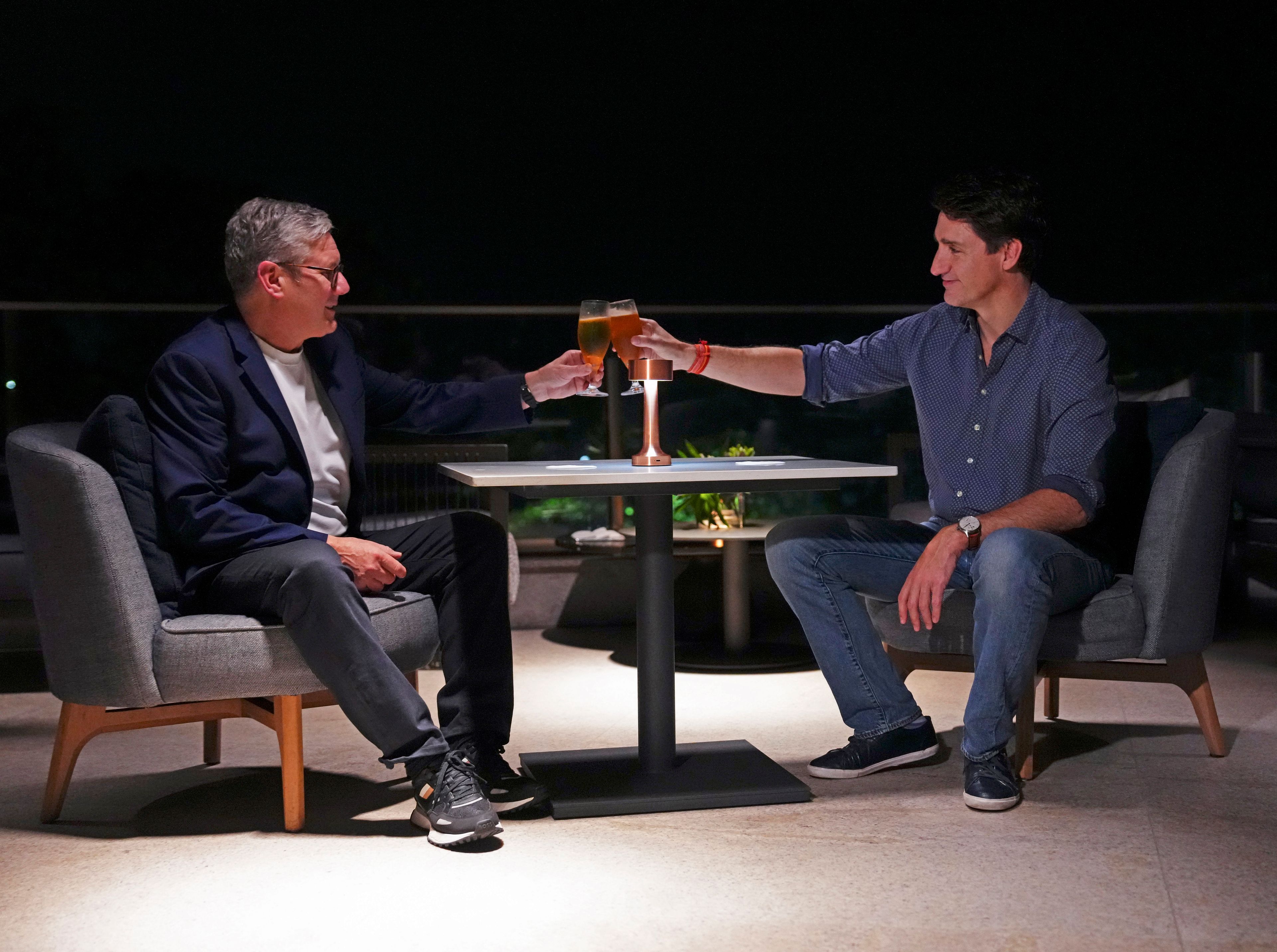 Canada's Prime Minister Justin Trudeau, right, meets with Britain's Prime Minister Keir Starmer during the G20 Summit in Rio de Janeiro, Monday, Nov. 18, 2024. (Sean Kilpatrick/The Canadian Press via AP)