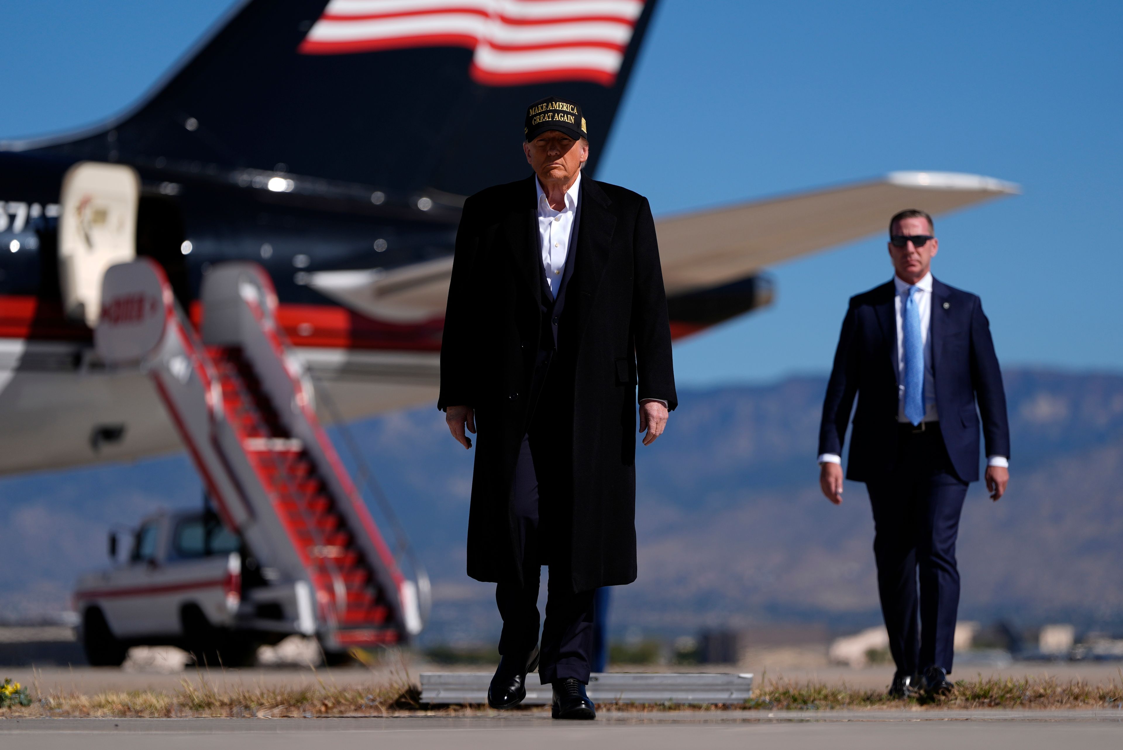 Republican presidential nominee former President Donald Trump arrives at a campaign rally at Albuquerque International Sunport, Thursday, Oct. 31, 2024, in Albuquerque, N.M. (AP Photo/Julia Demaree Nikhinson)