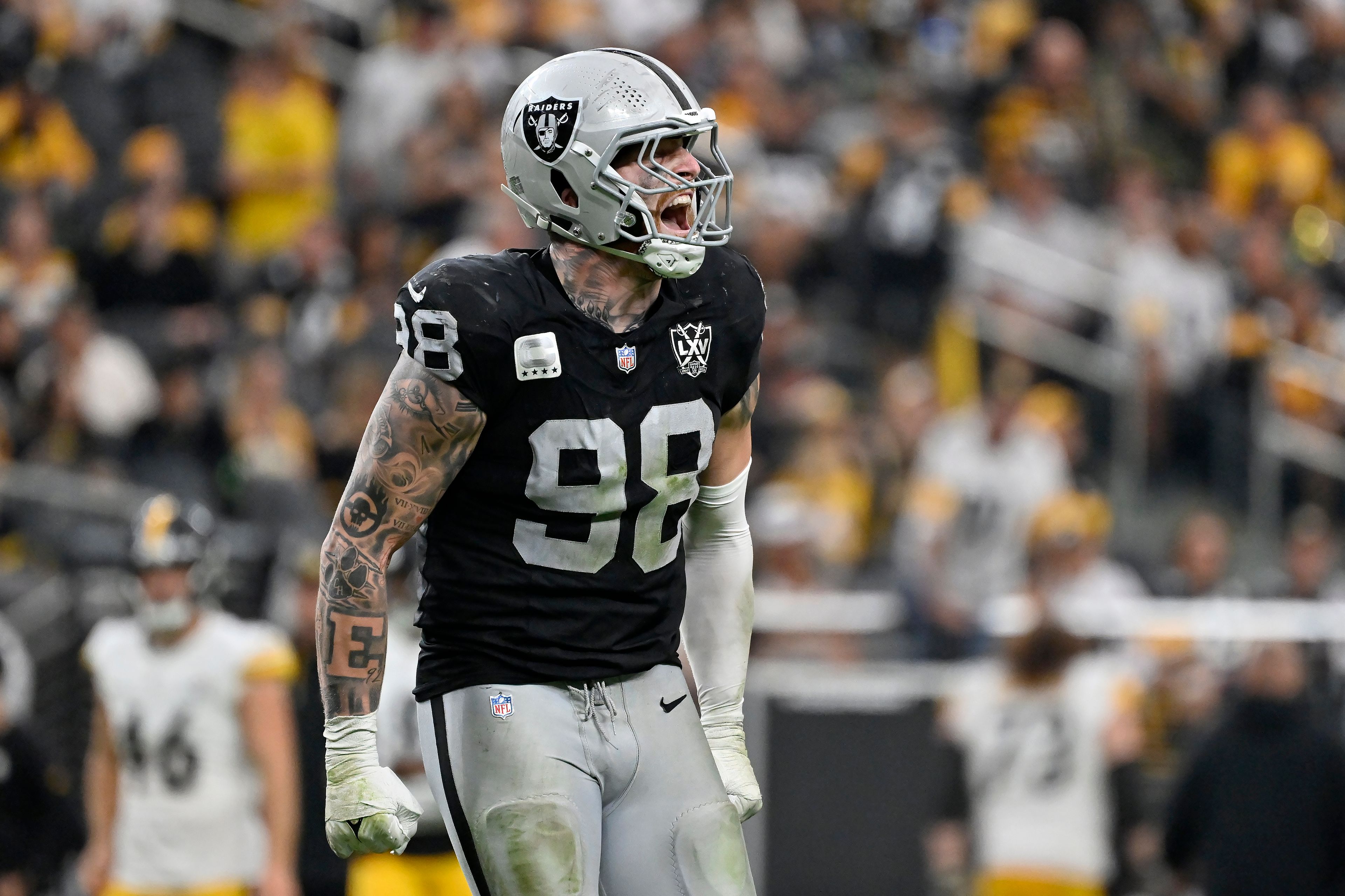 Las Vegas Raiders defensive end Maxx Crosby (98) reacts during the second half of an NFL football game against the Pittsburgh Steelers in Las Vegas, Sunday, Oct. 13, 2024. (AP Photo/David Becker)