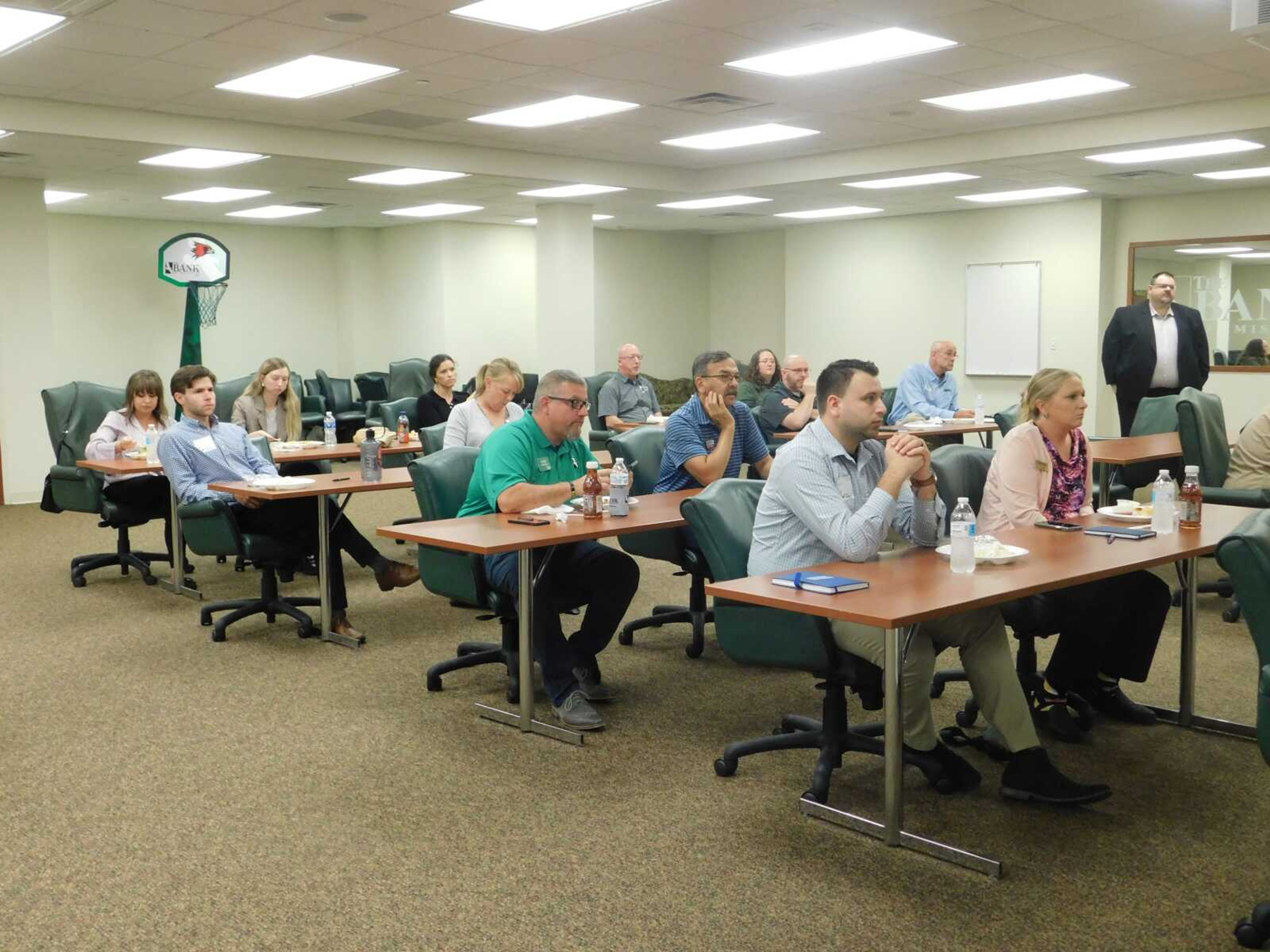 Around 20 business owners attended the Cape Girardeau Area Chamber of Commerce Lunch and Learn presentation Tuesday, Aug. 15, at The Bank of Missouri in Cape Girardeau. A trio of presenters showed them ways of adapting to new artificial intelligence technologies.