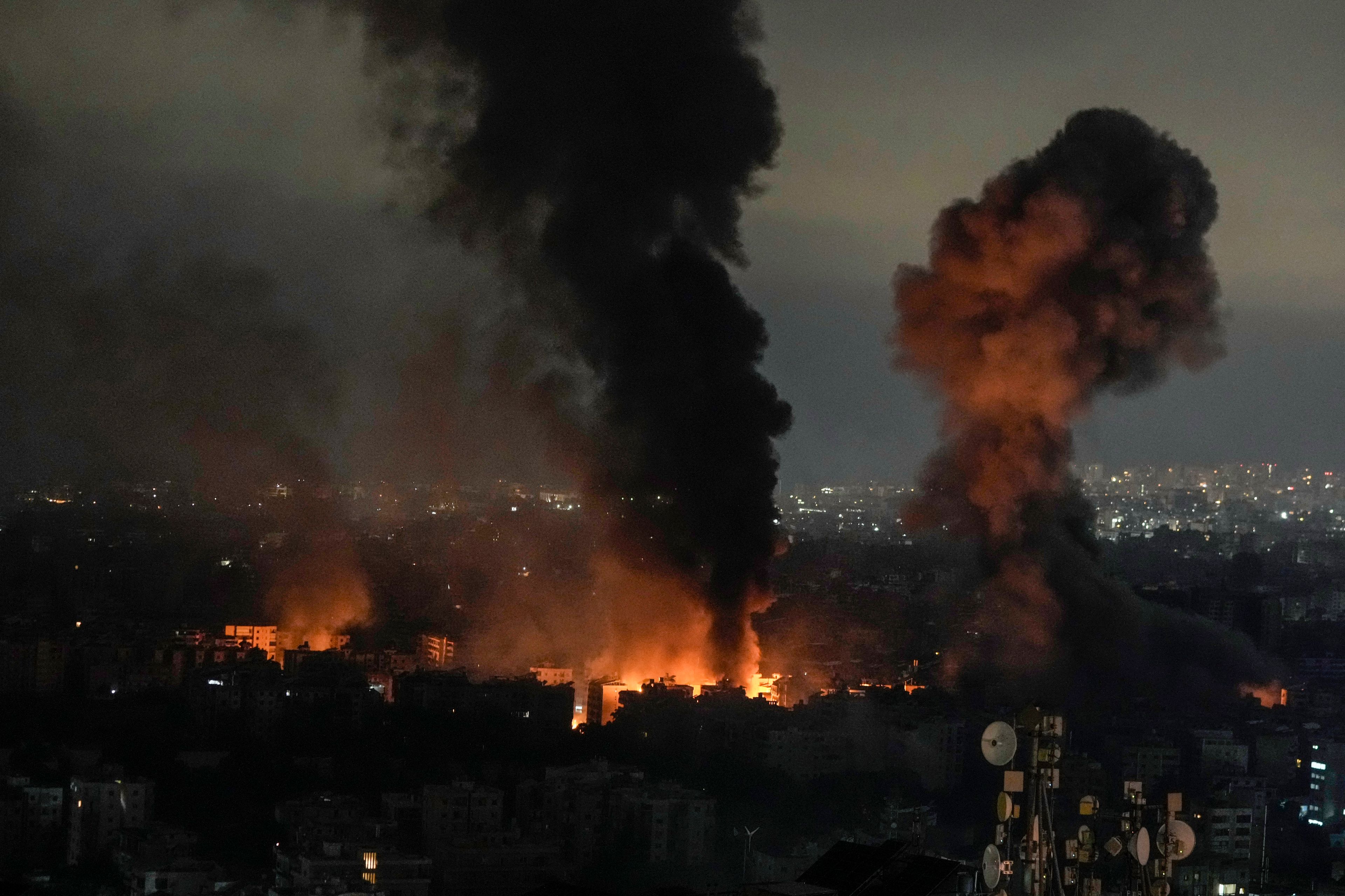 Flames and smoke rise from an Israeli airstrike in Dahiyeh, Beirut, Lebanon, early Monday, Oct. 7, 2024. (AP Photo/Bilal Hussein)