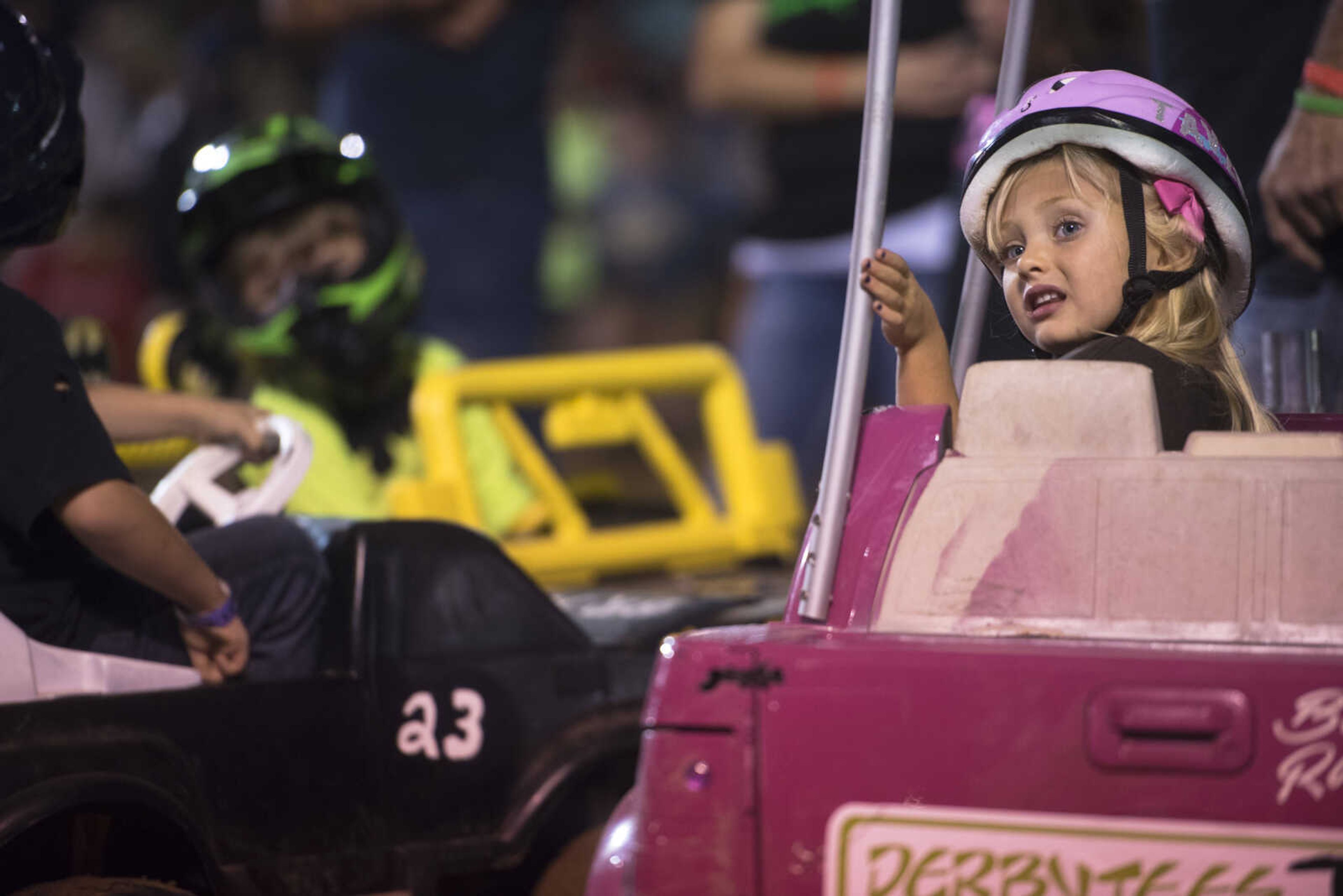 Children drive in a children's event in the Auto Tire & Parts Dual Demo Derby September 9, 2017, at the SEMO District Fair in Cape Girardeau.